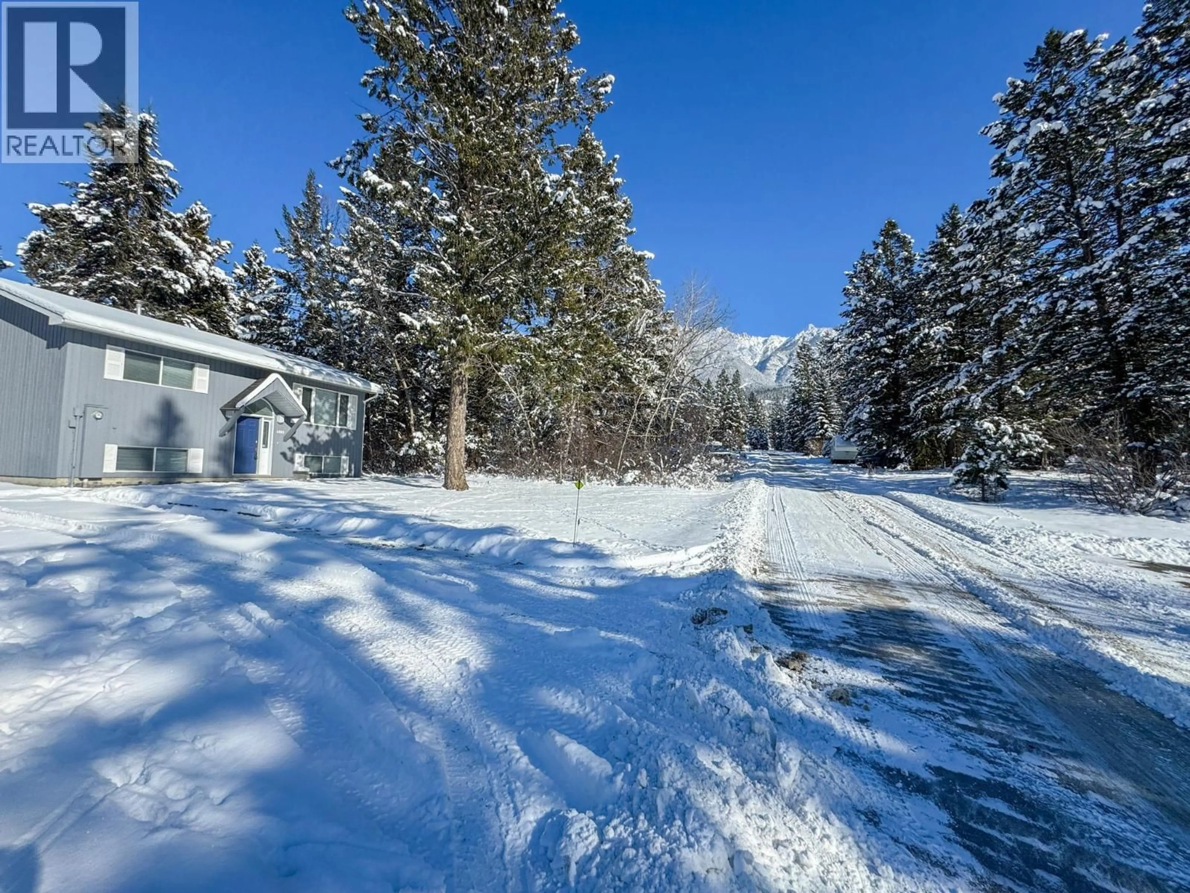 A pic from outside/outdoor area/front of a property/back of a property/a pic from drone, unknown for 4885 REDWING ROAD, Fairmont Hot Springs British Columbia V0B1L1