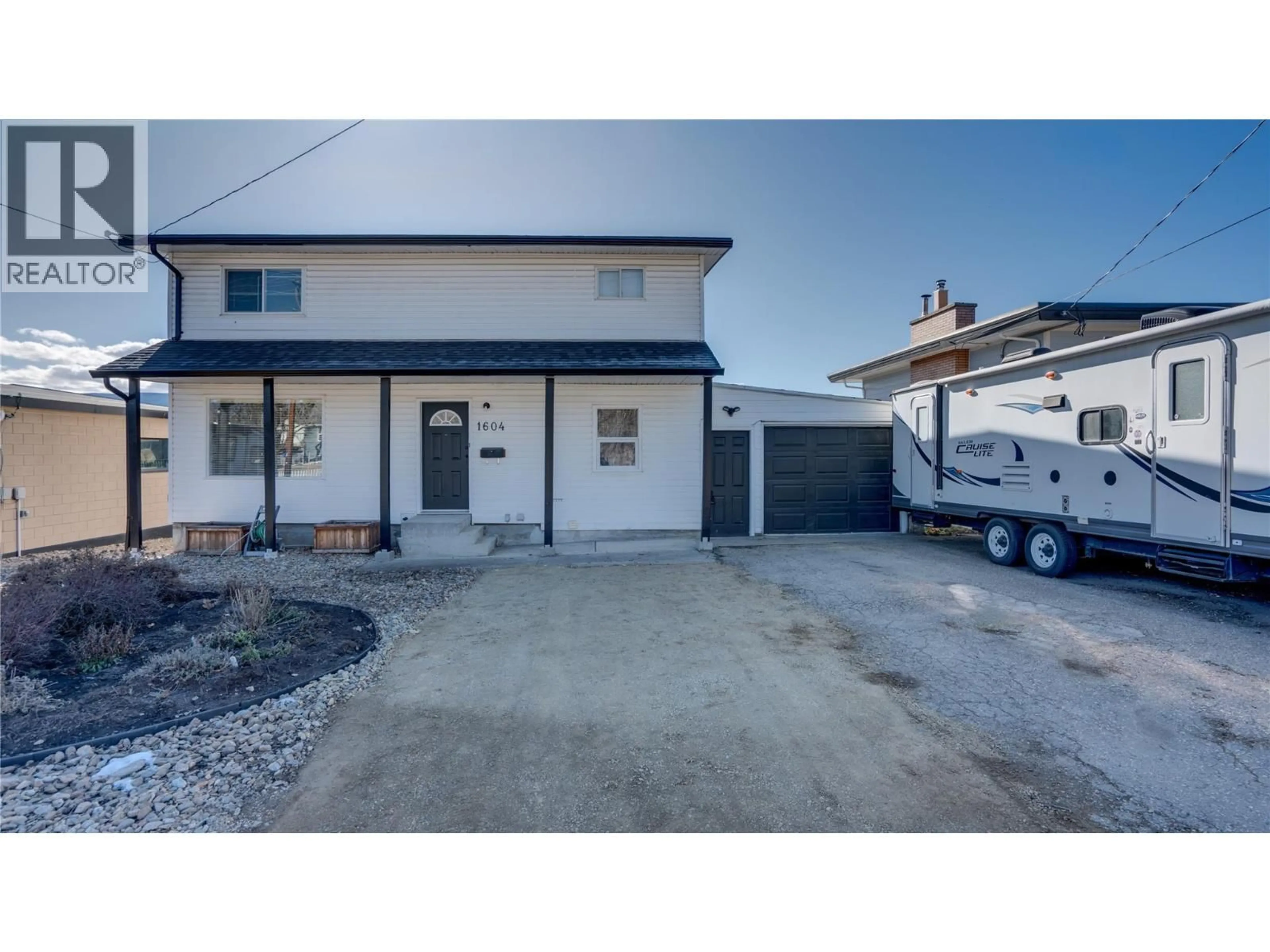 A pic from outside/outdoor area/front of a property/back of a property/a pic from drone, street for 1604 25 AVENUE, Vernon British Columbia V1T1M7