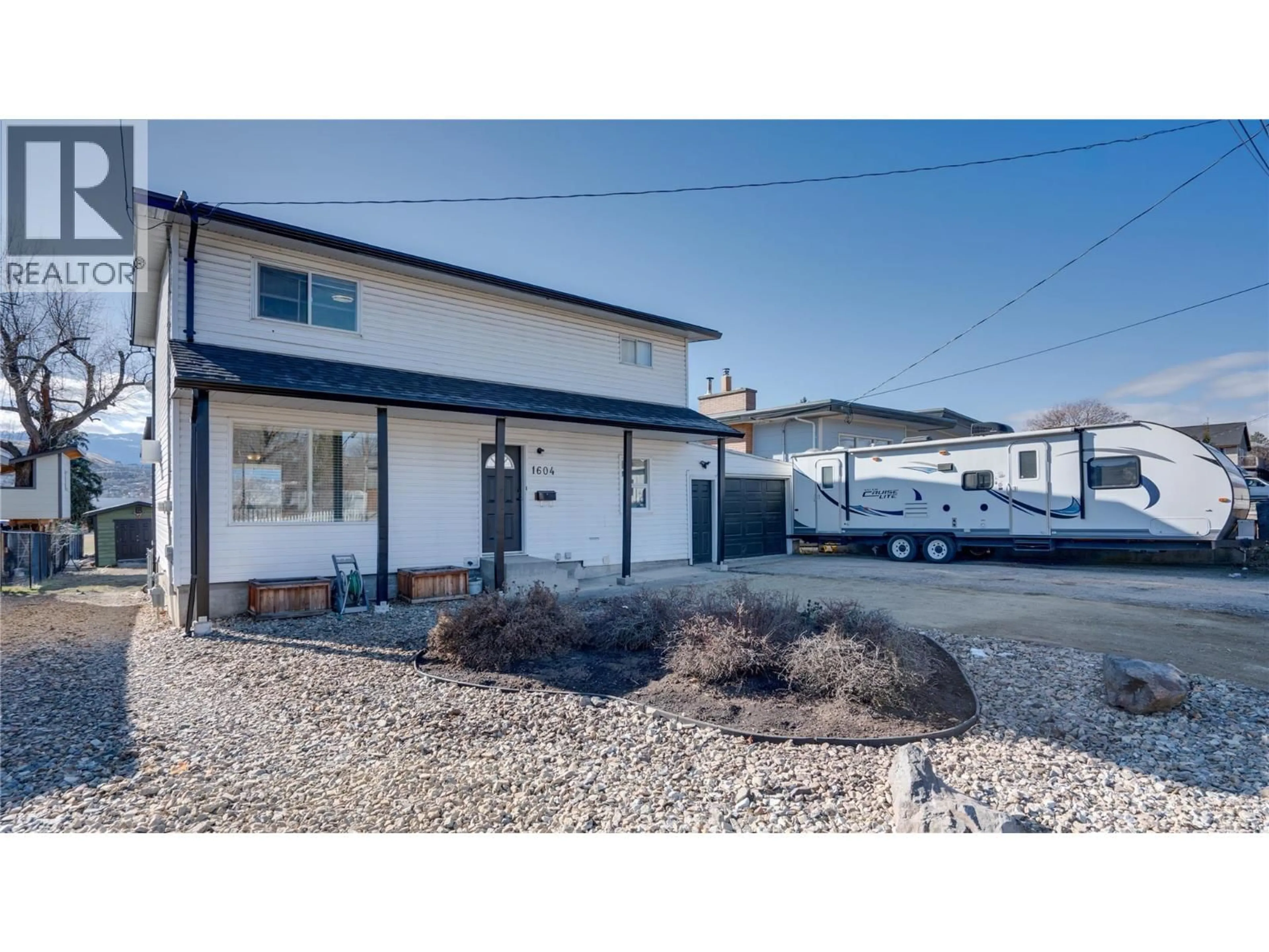A pic from outside/outdoor area/front of a property/back of a property/a pic from drone, street for 1604 25 AVENUE, Vernon British Columbia V1T1M7