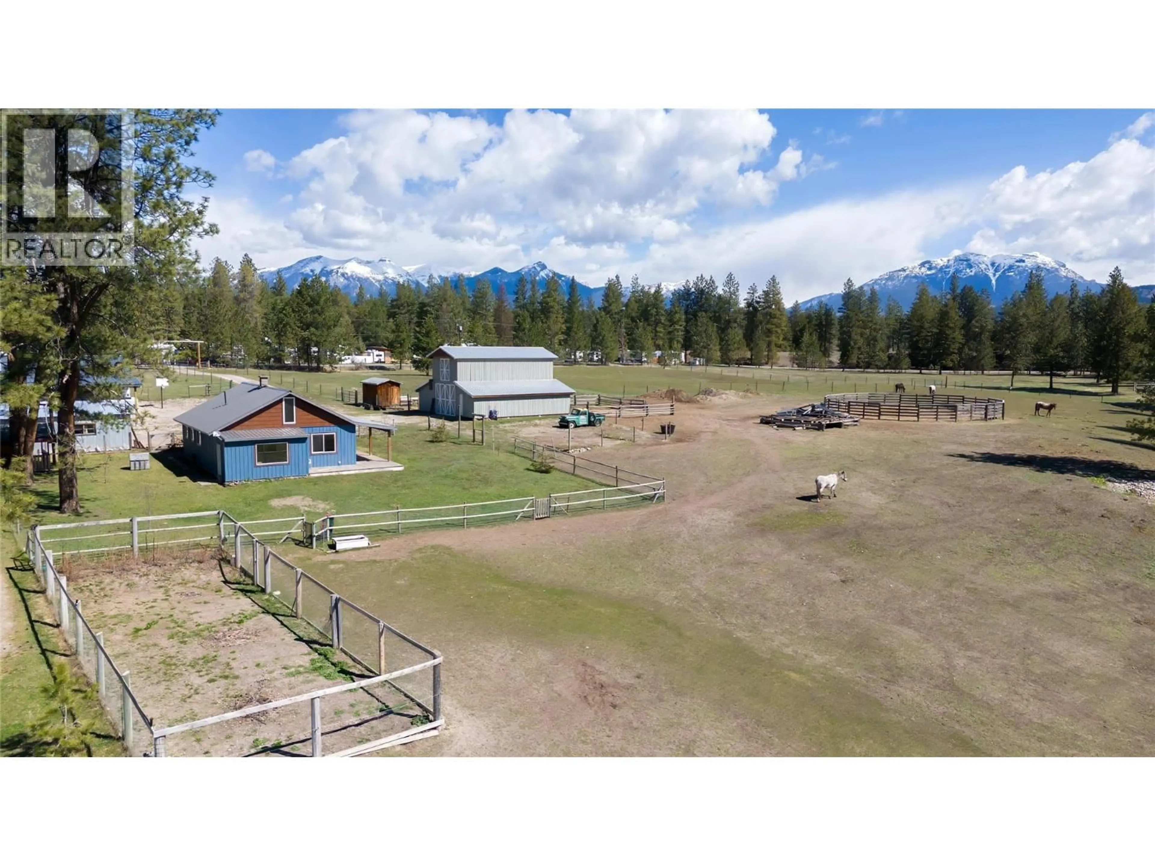 A pic from outside/outdoor area/front of a property/back of a property/a pic from drone, mountain view for 505 CHIEF DAVID ROAD, Baynes Lake British Columbia V0B1T4