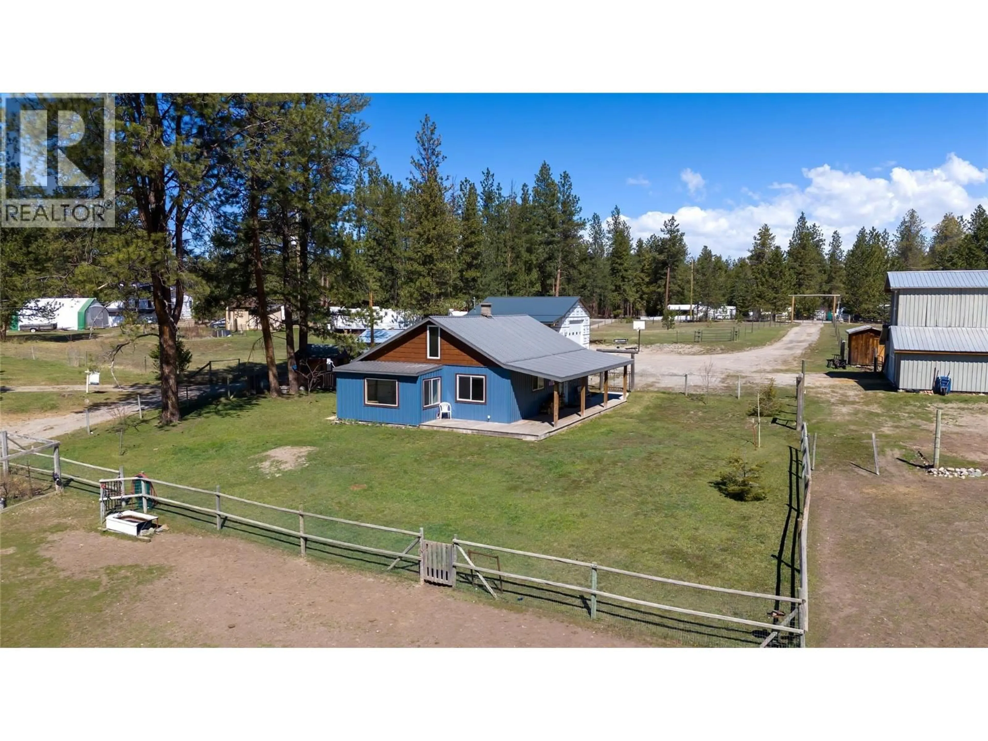 A pic from outside/outdoor area/front of a property/back of a property/a pic from drone, mountain view for 505 CHIEF DAVID ROAD, Baynes Lake British Columbia V0B1T4