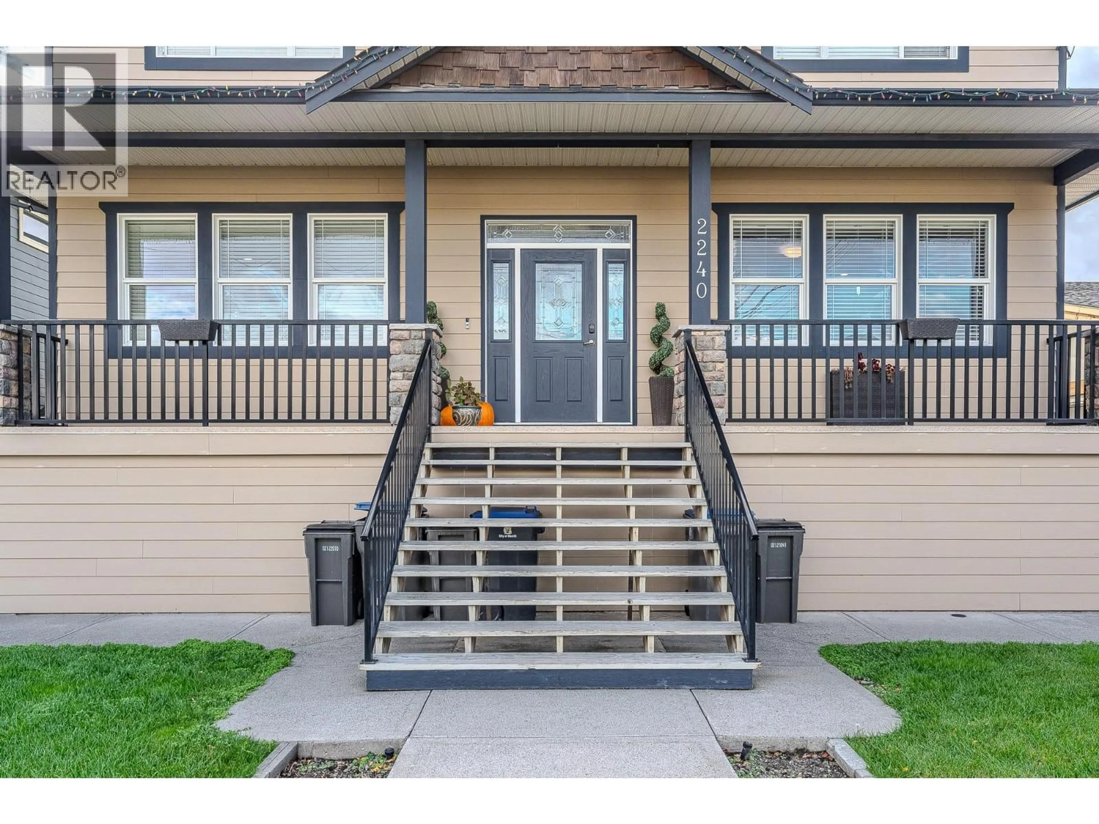 Home with vinyl exterior material, street for 2240 JACKSON AVENUE, Merritt British Columbia V1K1B8