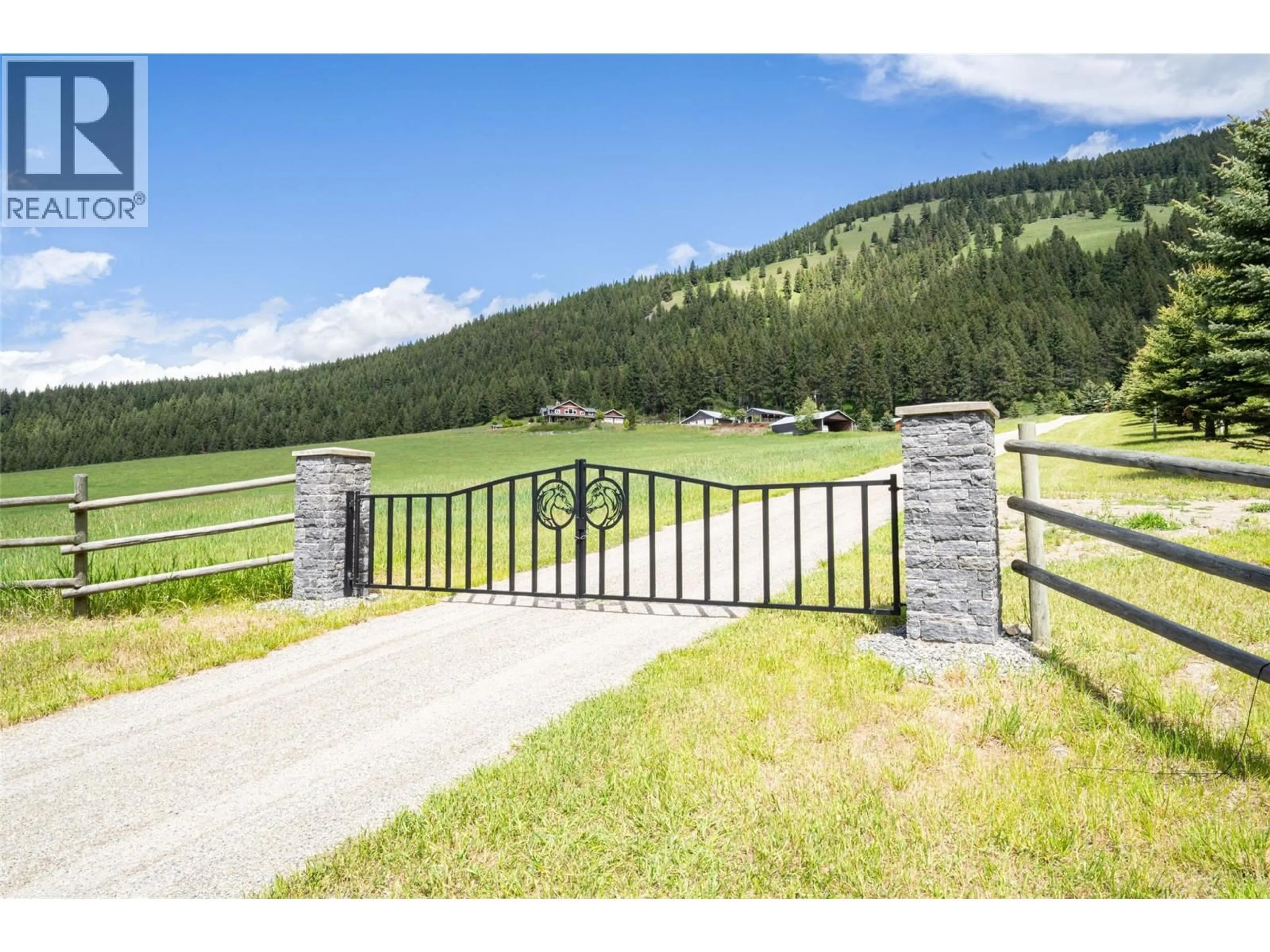 A pic from outside/outdoor area/front of a property/back of a property/a pic from drone, mountain view for 705 CREIGHTON VALLEY ROAD, Lumby British Columbia V0E2G1
