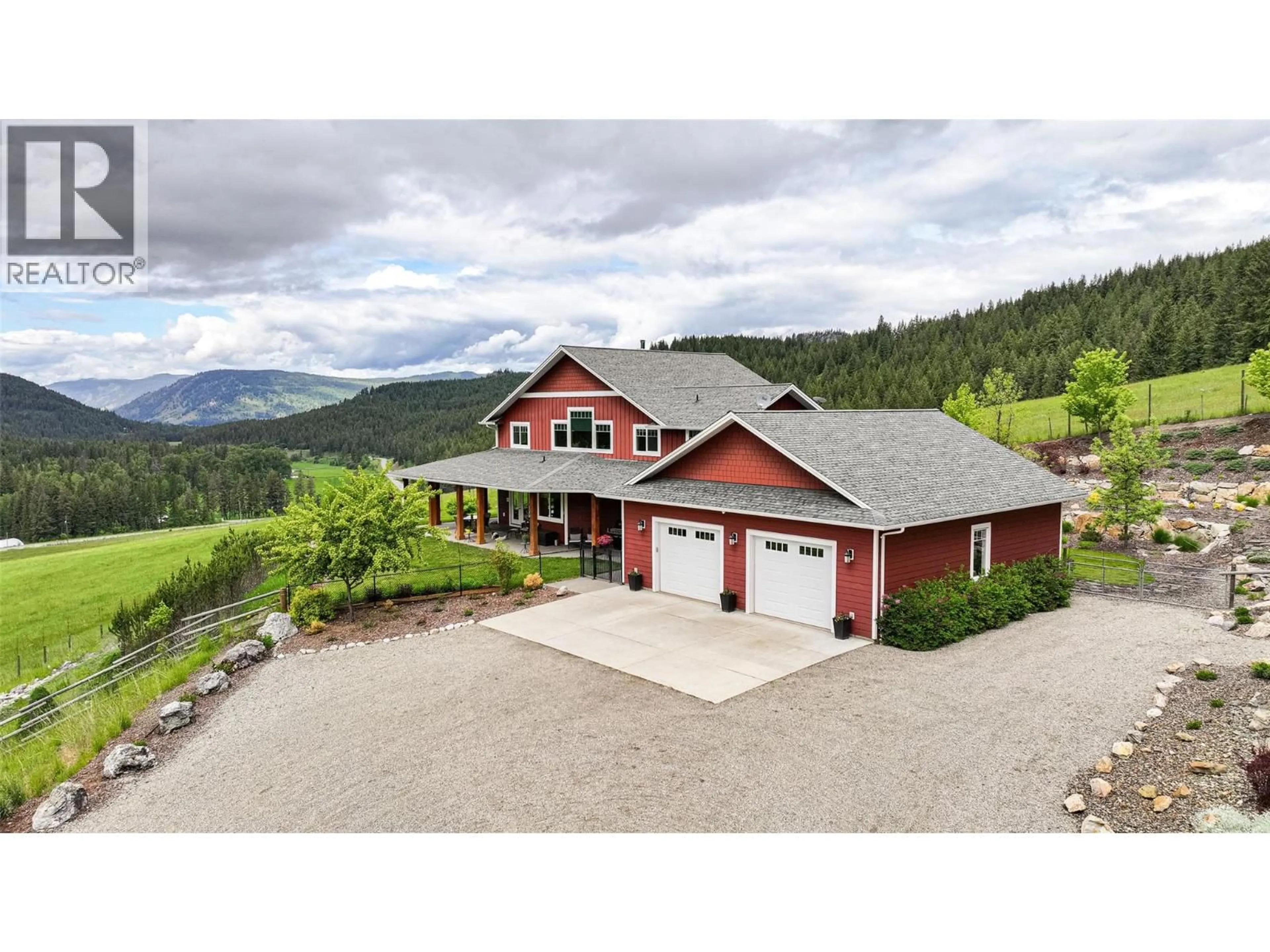 A pic from outside/outdoor area/front of a property/back of a property/a pic from drone, mountain view for 705 CREIGHTON VALLEY ROAD, Lumby British Columbia V0E2G1