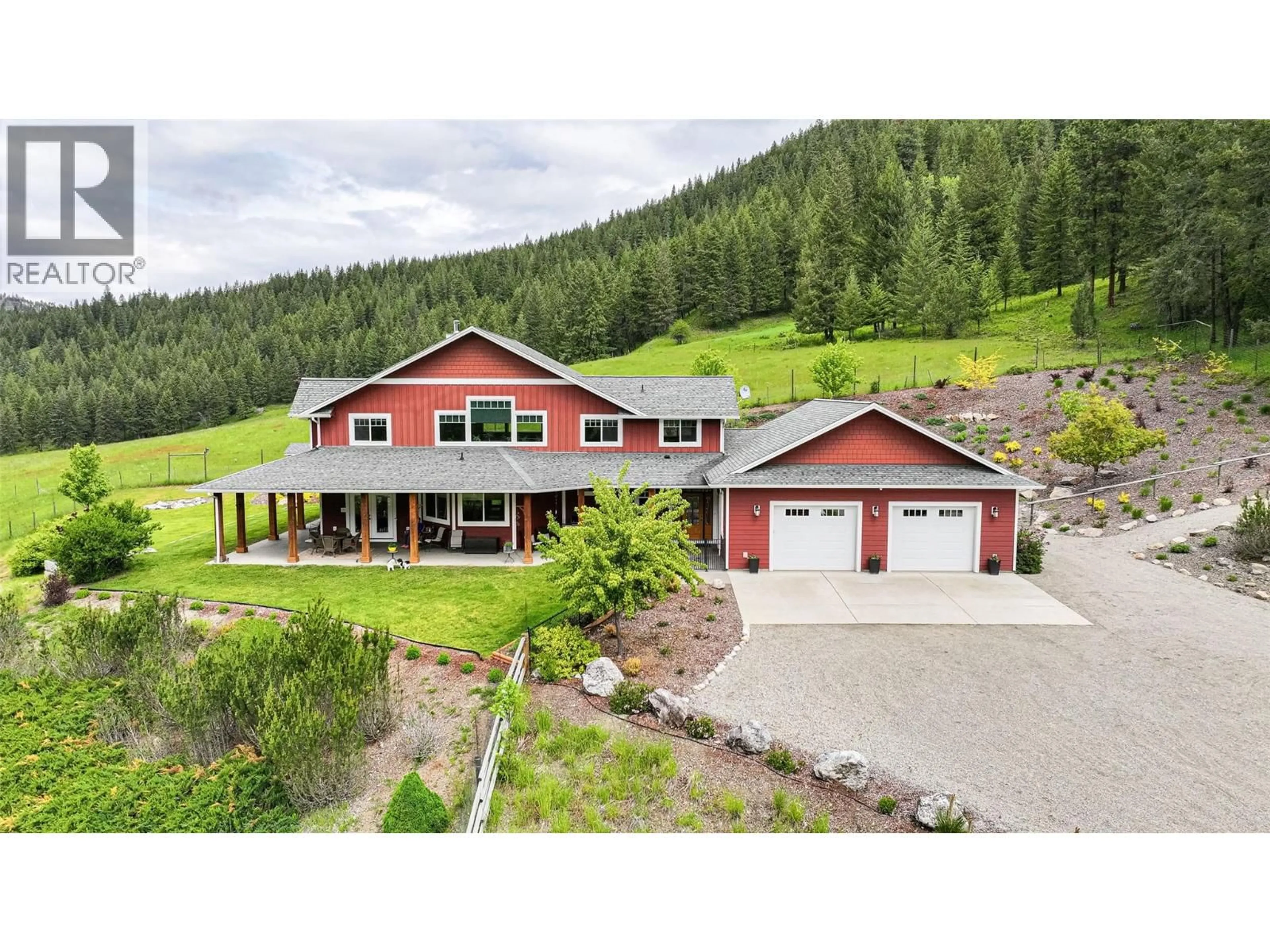 A pic from outside/outdoor area/front of a property/back of a property/a pic from drone, mountain view for 705 CREIGHTON VALLEY ROAD, Lumby British Columbia V0E2G1