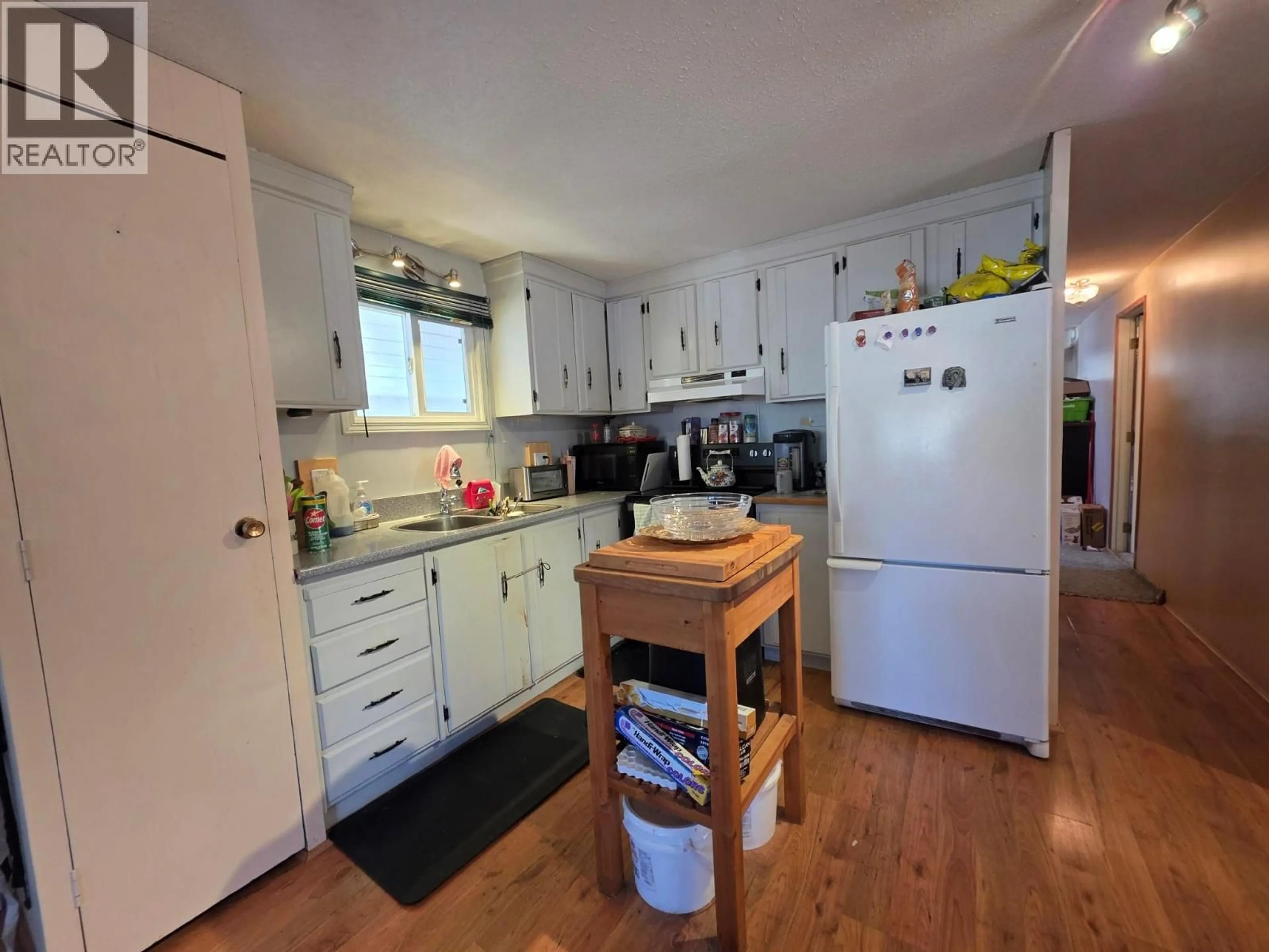Standard kitchen, wood/laminate floor for 4300 VICTORIA AVENUE EAST, Grand Forks British Columbia V0H1H5