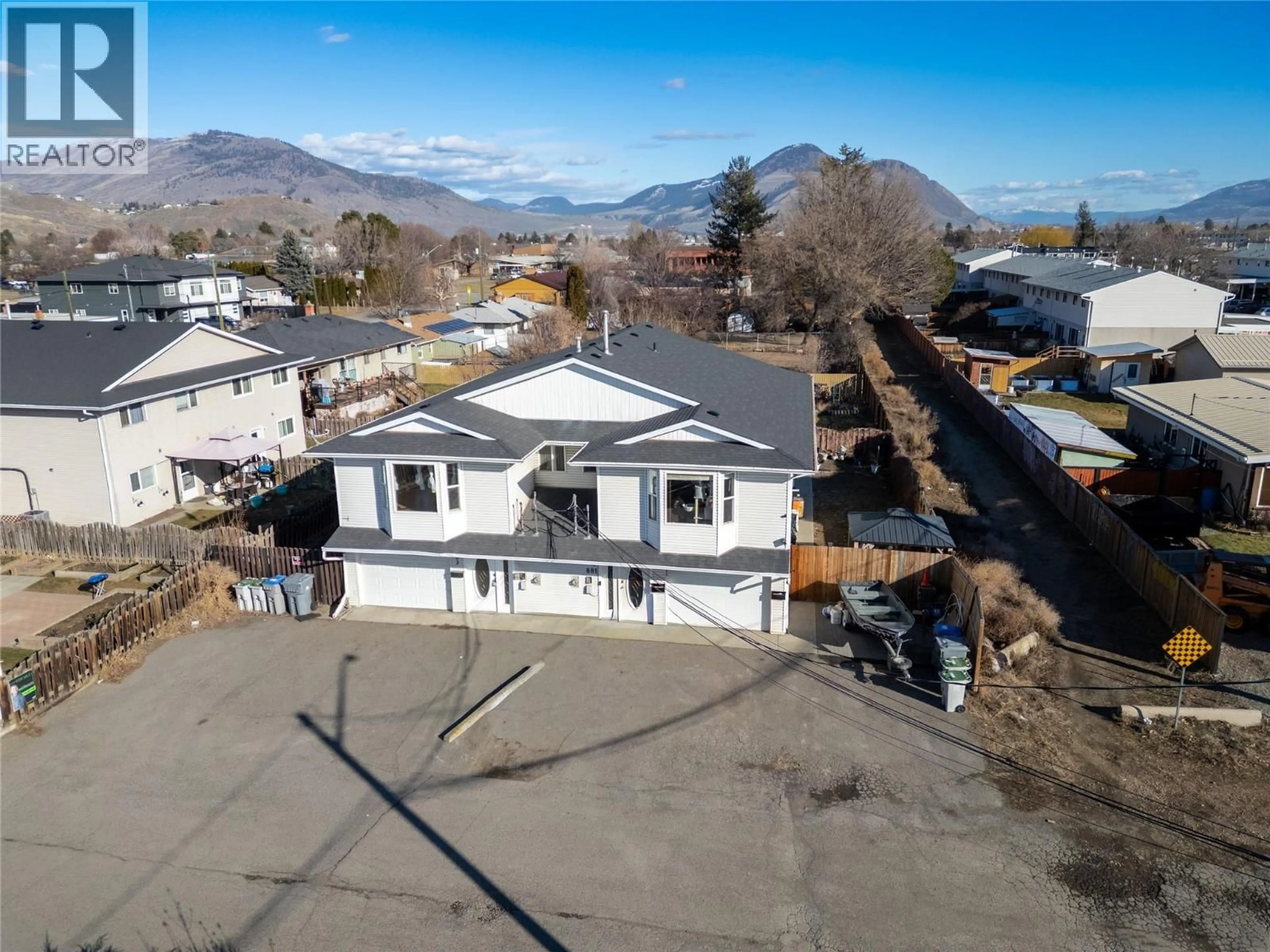 A pic from outside/outdoor area/front of a property/back of a property/a pic from drone, mountain view for 881 EVERGREEN PLACE, Kamloops British Columbia V2B5M7