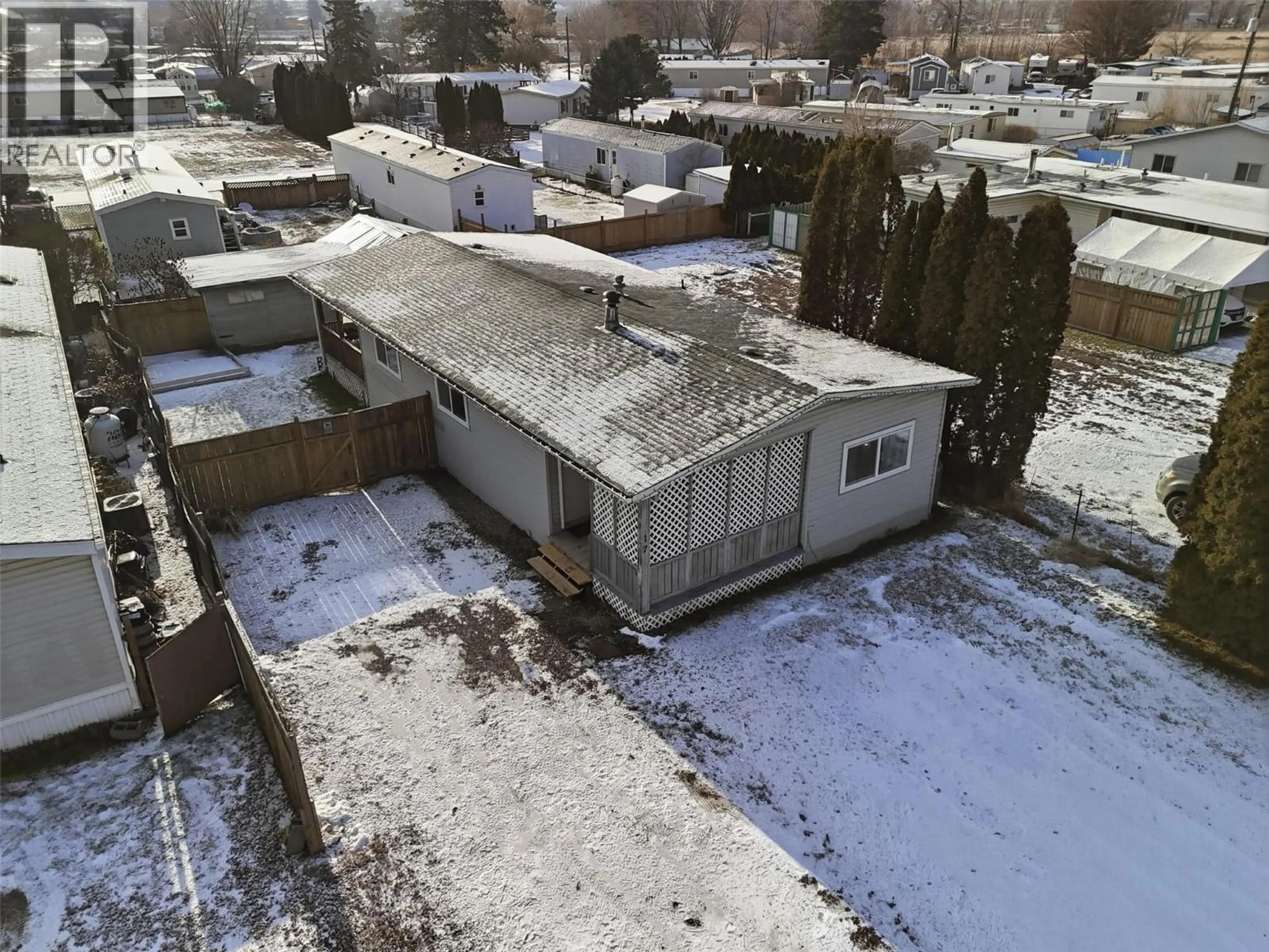 A pic from outside/outdoor area/front of a property/back of a property/a pic from drone, unknown for E17 - 220 G&M ROAD, Kamloops British Columbia V2C1A4