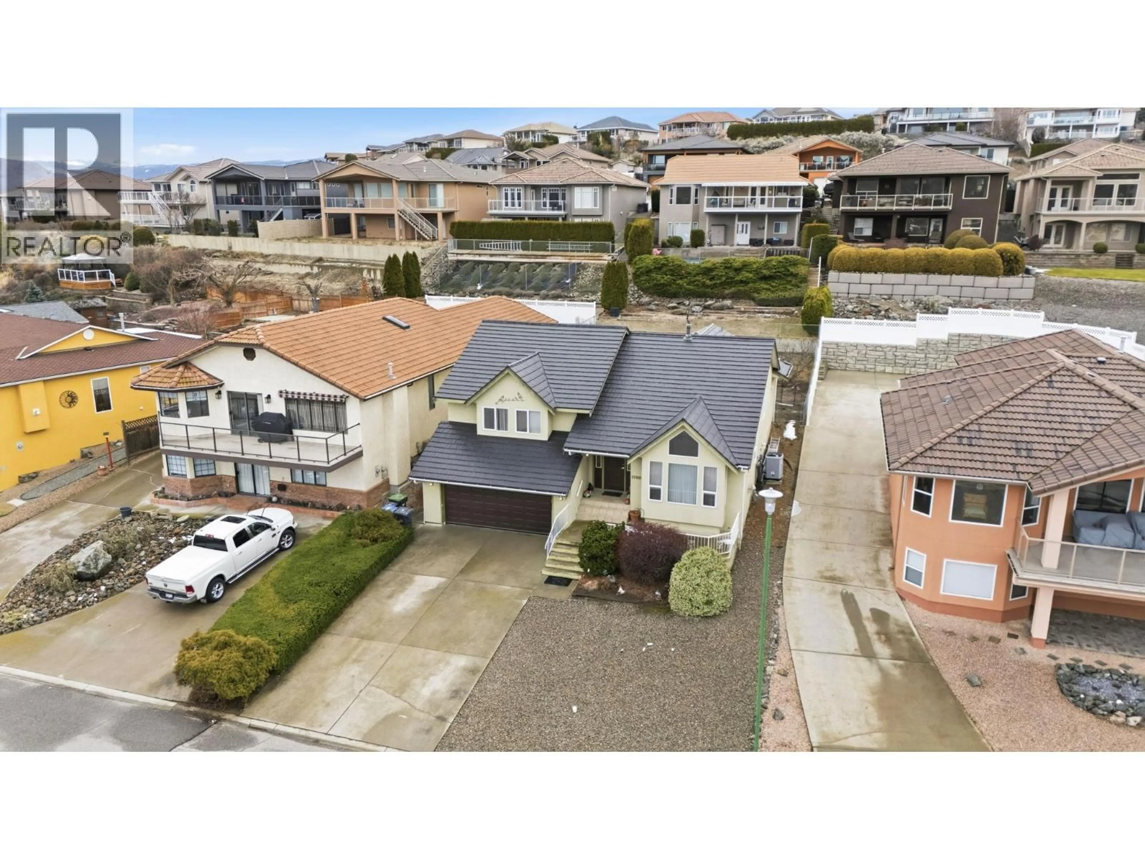 A pic from outside/outdoor area/front of a property/back of a property/a pic from drone, street for 11908 QUAIL RIDGE PLACE, Osoyoos British Columbia V0H1V4