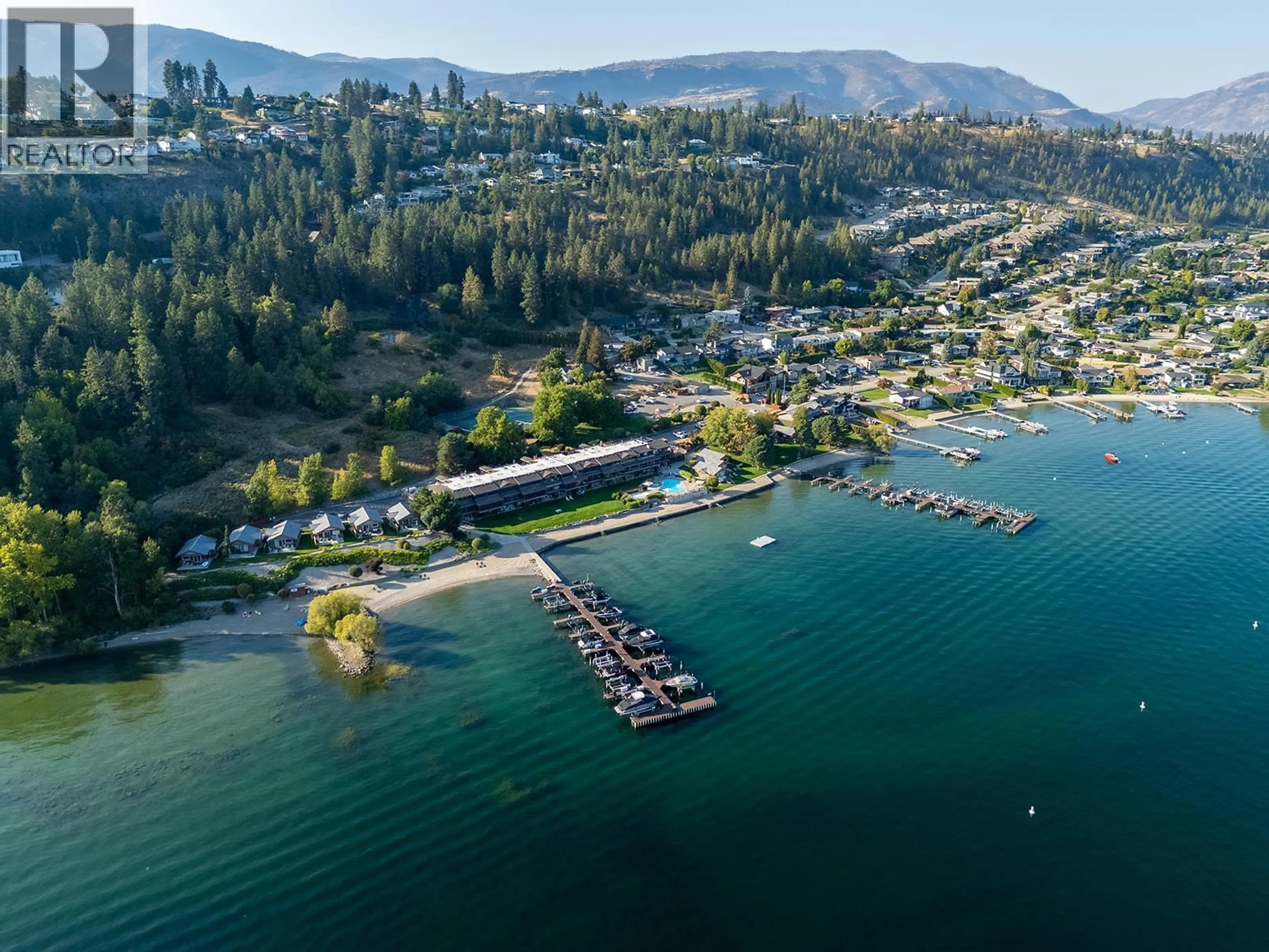 A pic from outside/outdoor area/front of a property/back of a property/a pic from drone, water/lake/river/ocean view for 301 - 2777 CASA LOMA ROAD, West Kelowna British Columbia V1Z1T6