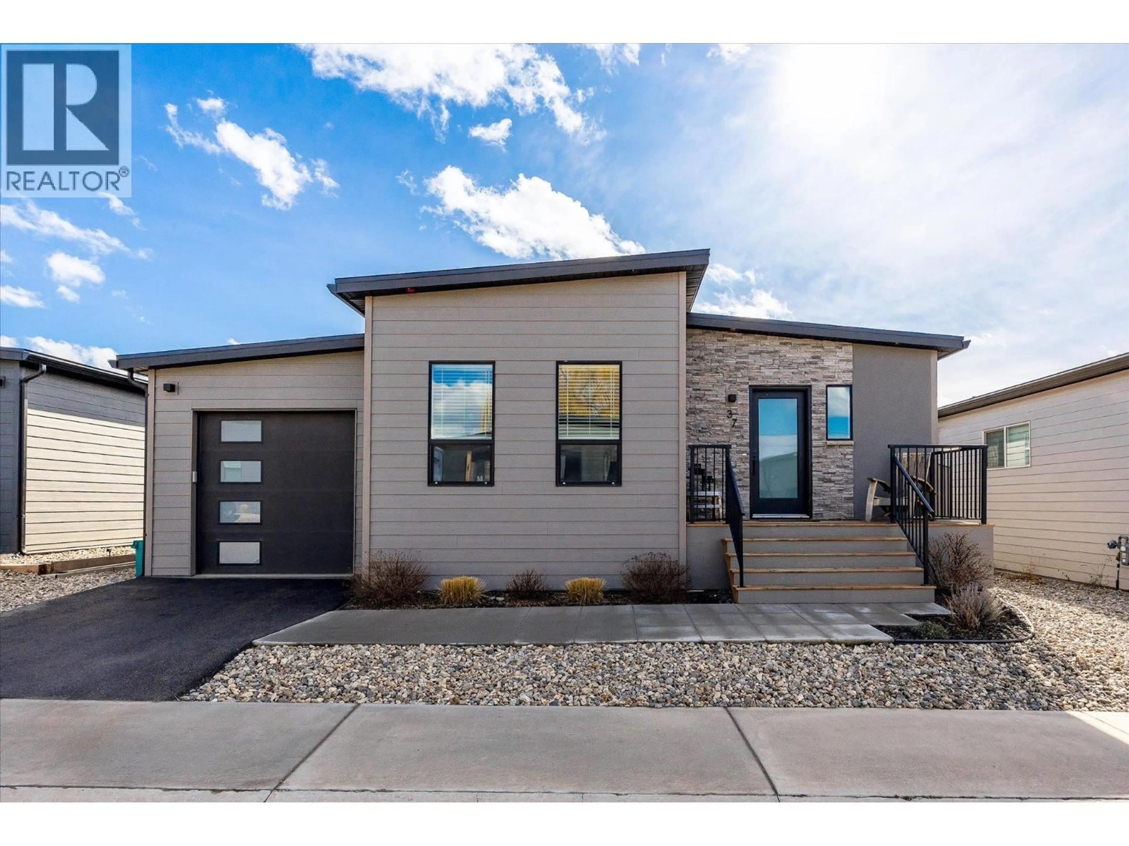 Home with vinyl exterior material, street for 37 - 8900 JIM BAILEY ROAD, Kelowna British Columbia V4V1S4