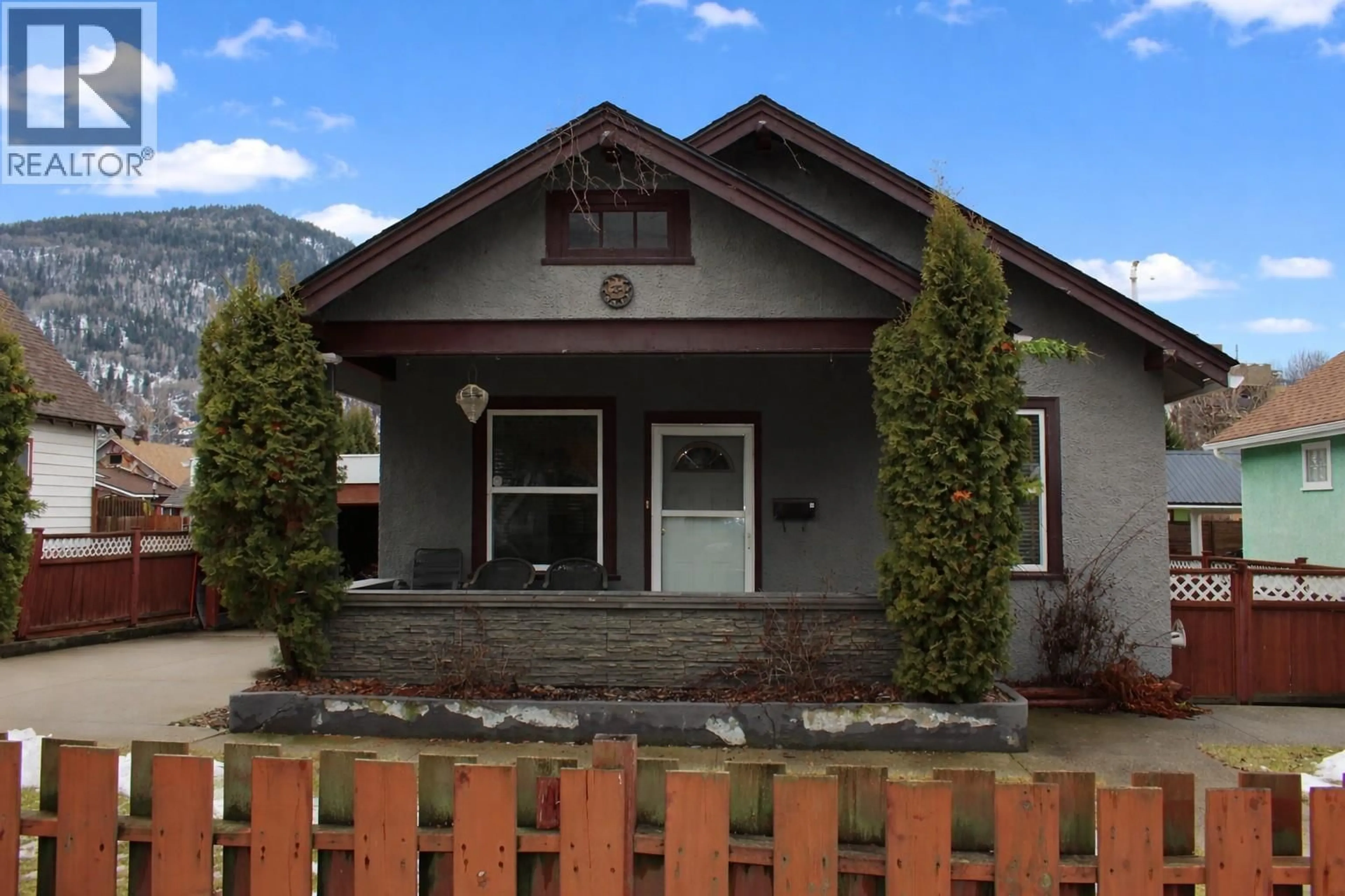 Home with vinyl exterior material, mountain view for 1360 SECOND AVENUE, Trail British Columbia V1R6P6