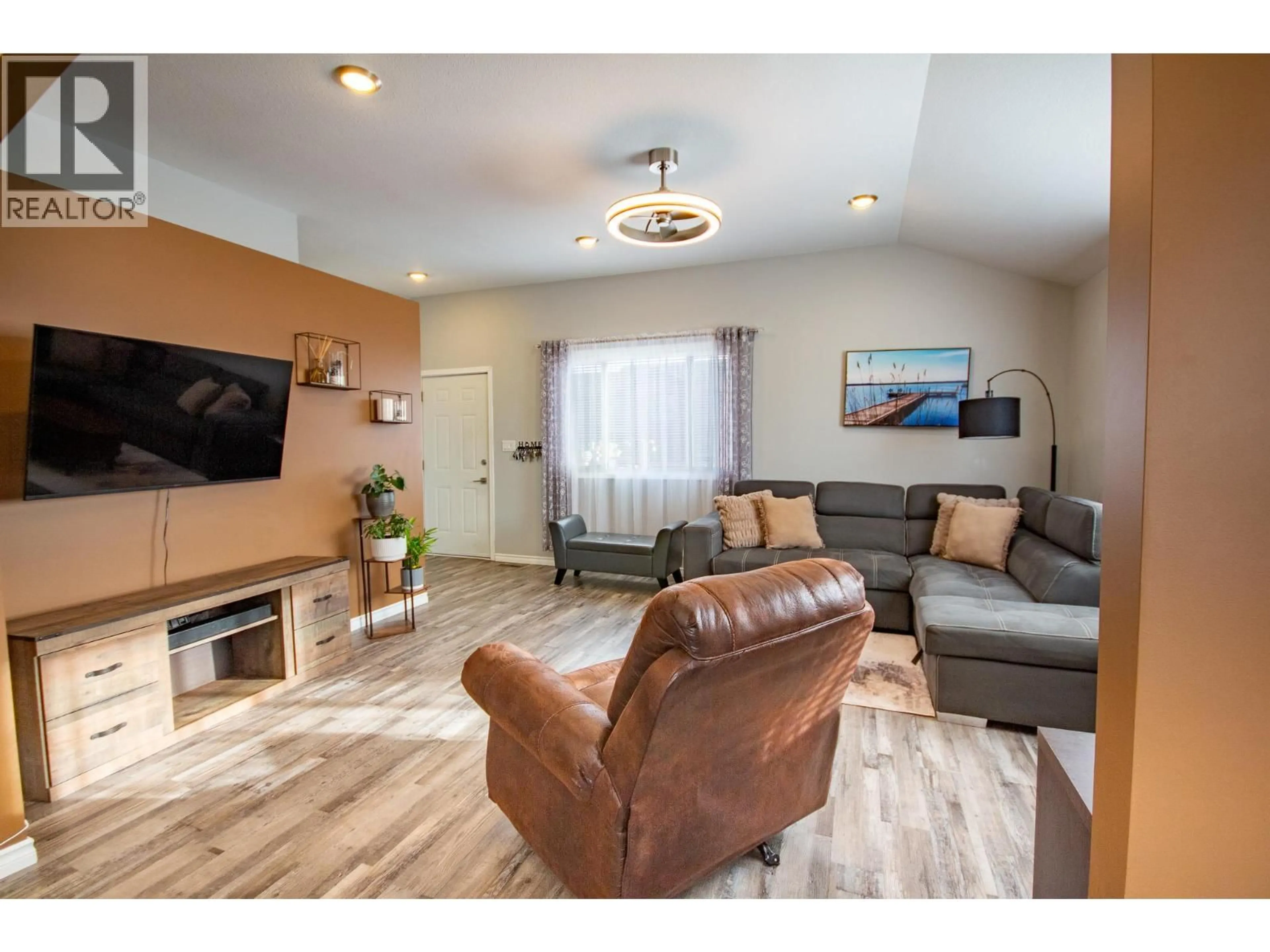 Living room with furniture, unknown for 1500 96 AVENUE, Dawson Creek British Columbia V1G1L6