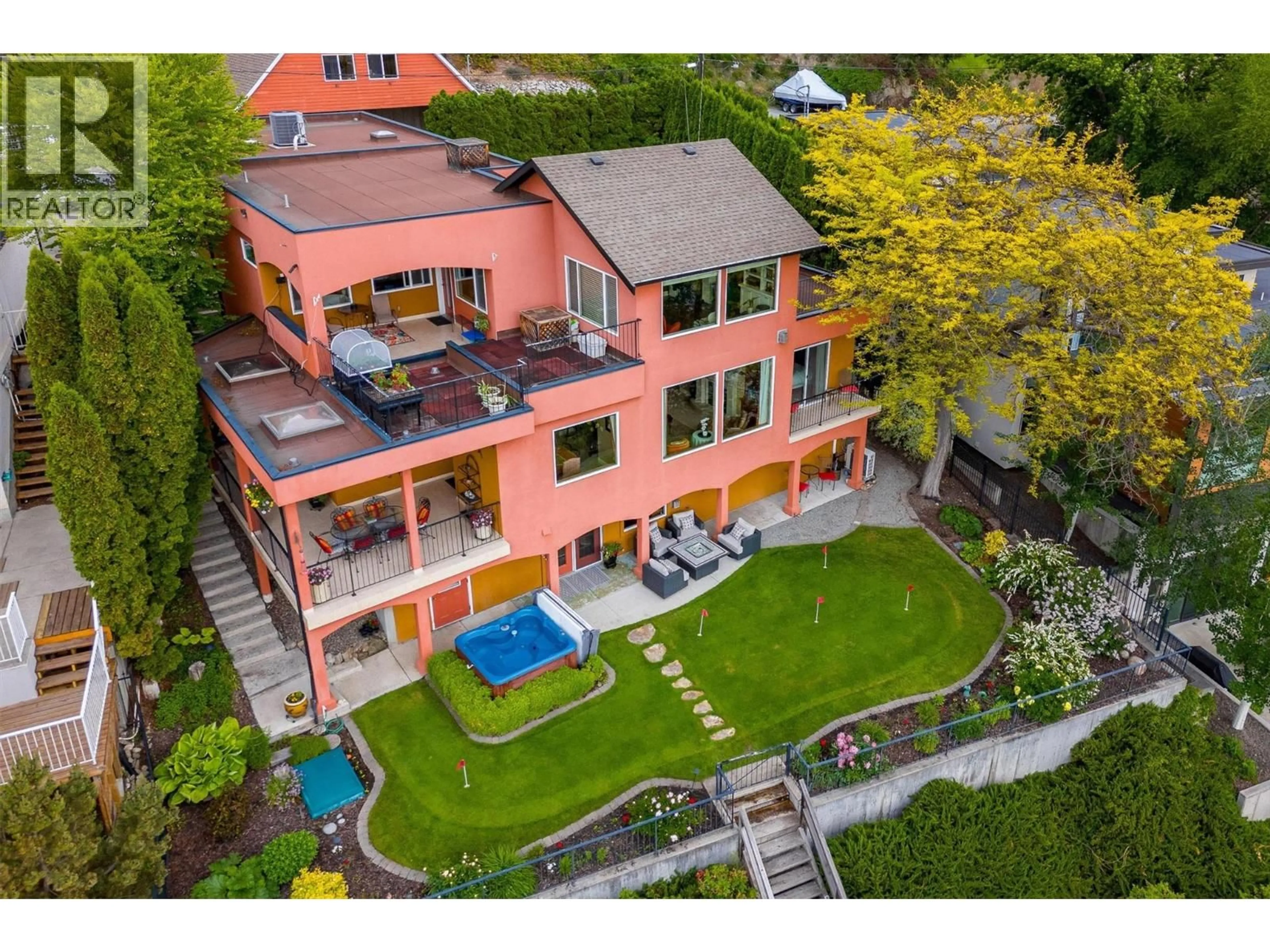 A pic from outside/outdoor area/front of a property/back of a property/a pic from drone, unknown for 683 WESTSIDE ROAD SOUTH, West Kelowna British Columbia V1Z3S2