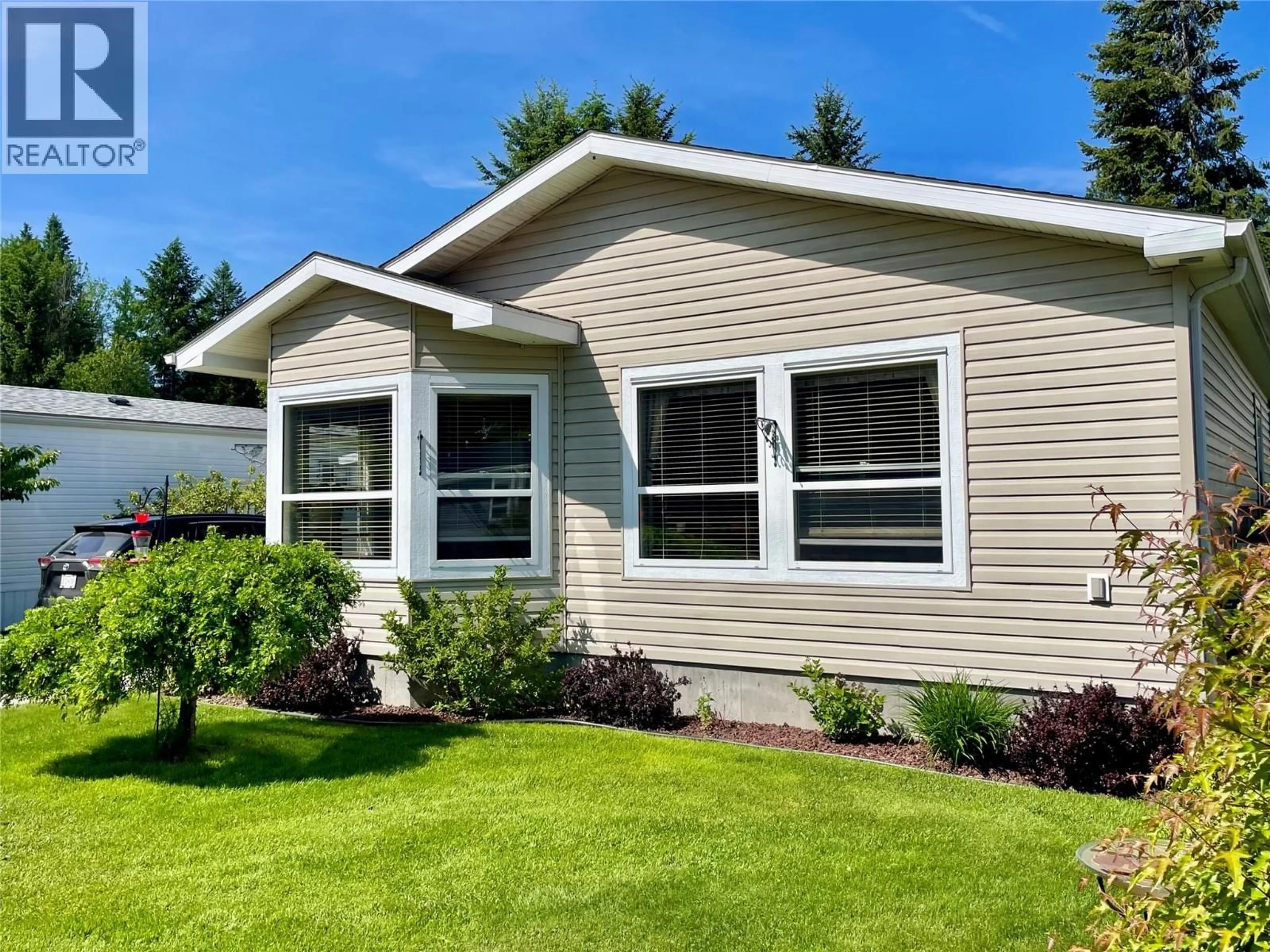 Home with vinyl exterior material, street for 5 - 1500 NEIMI ROAD, Christina Lake British Columbia V0H1H2