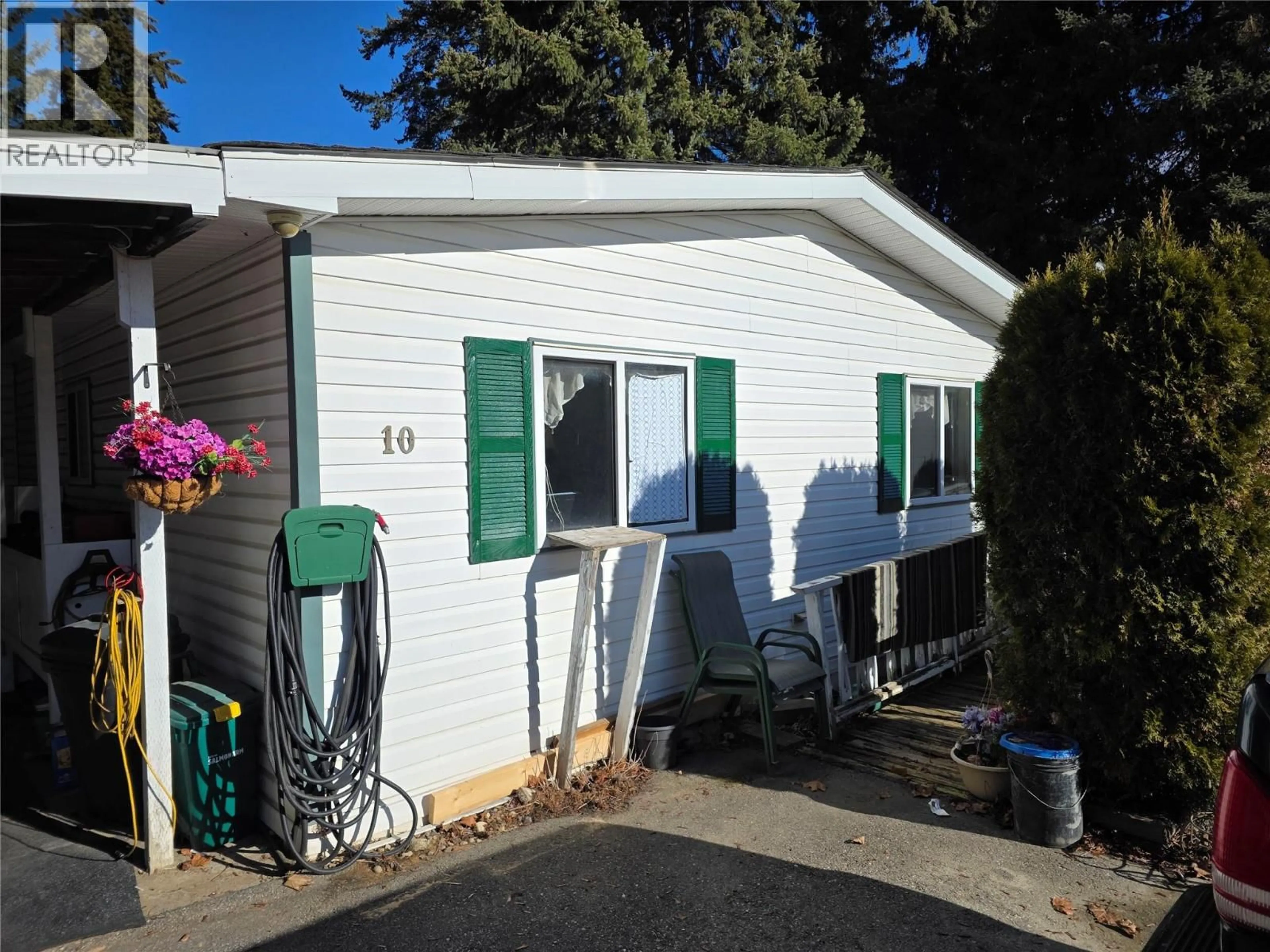 Home with vinyl exterior material, street for 10 - 2500 97B HIGHWAY, Salmon Arm British Columbia V1E1A6