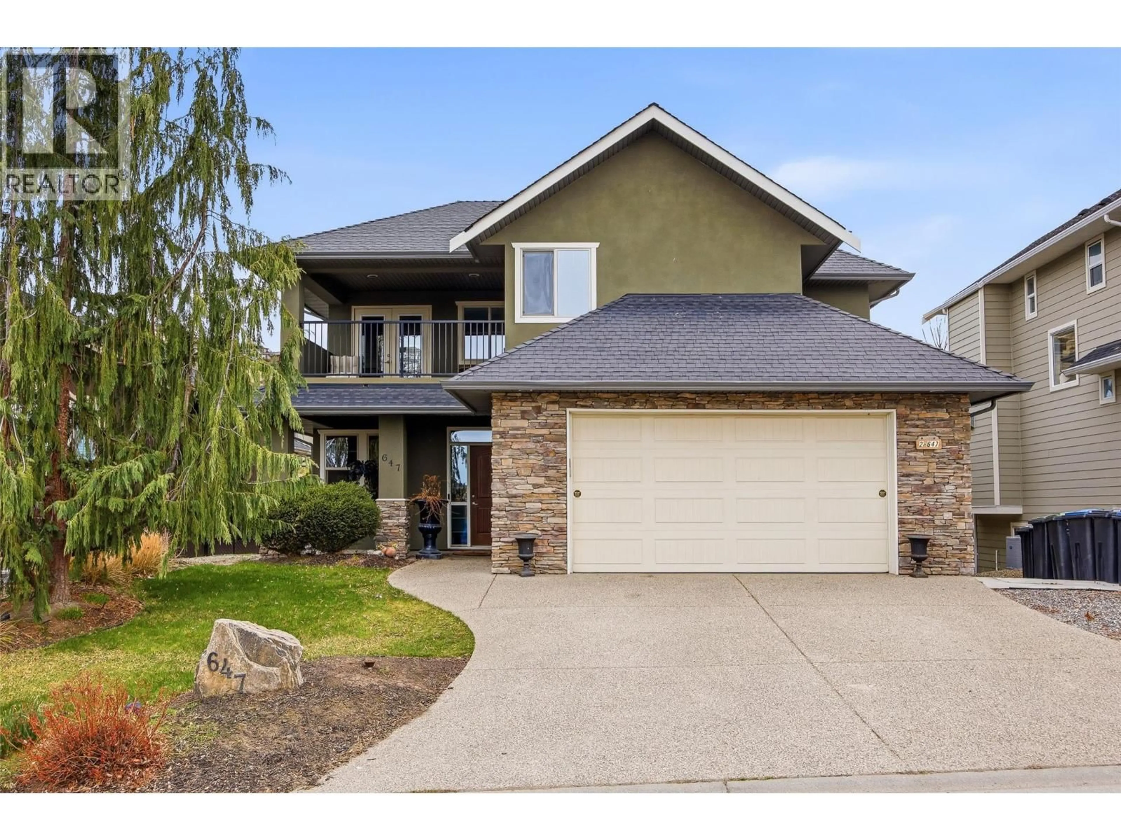 Home with brick exterior material, street for 647 PERIDOT PLACE, Kelowna British Columbia V1W5E7