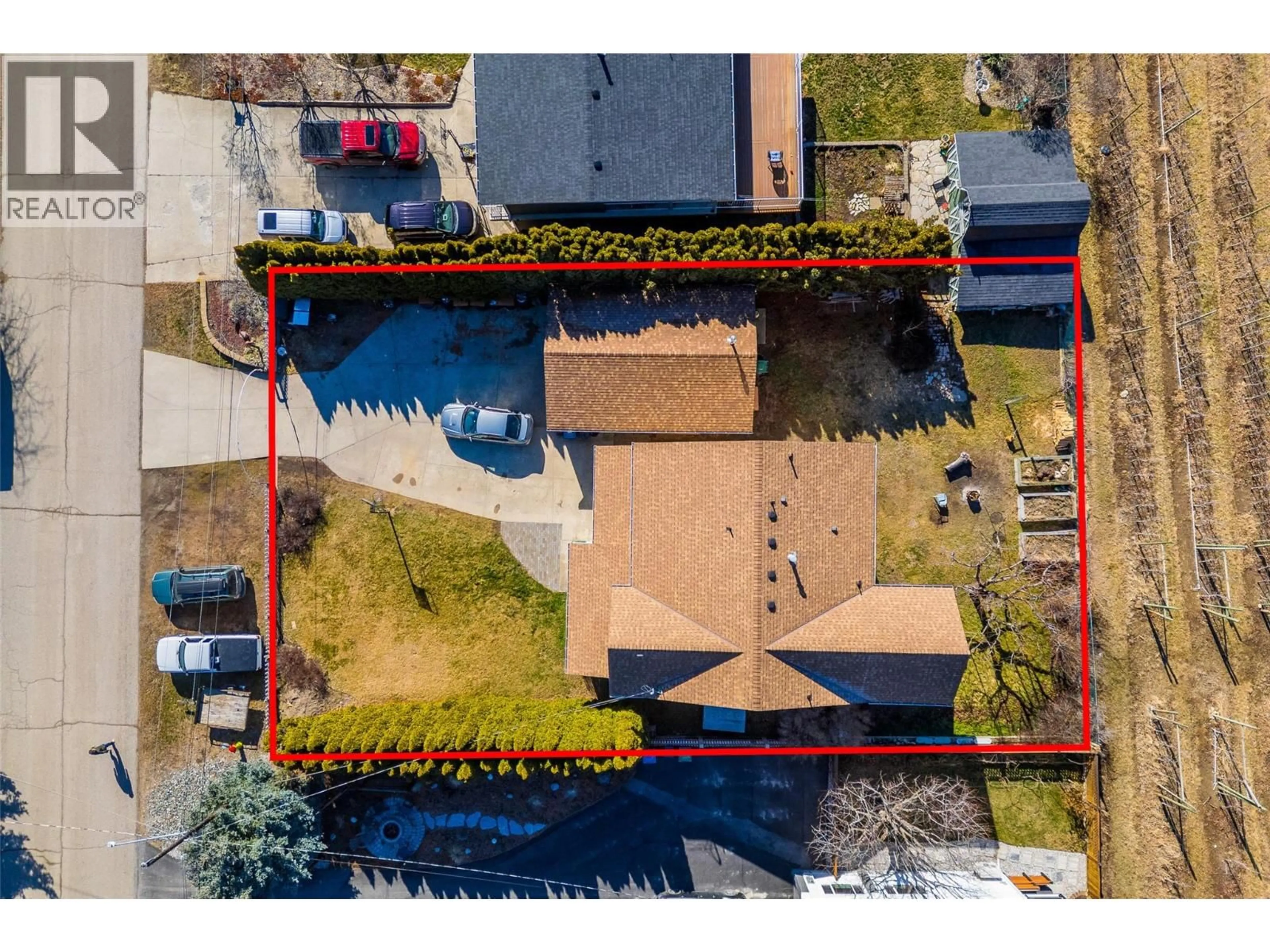 A pic from outside/outdoor area/front of a property/back of a property/a pic from drone, street for 14286 HARMEN ROAD, Lake Country British Columbia V4V2B9