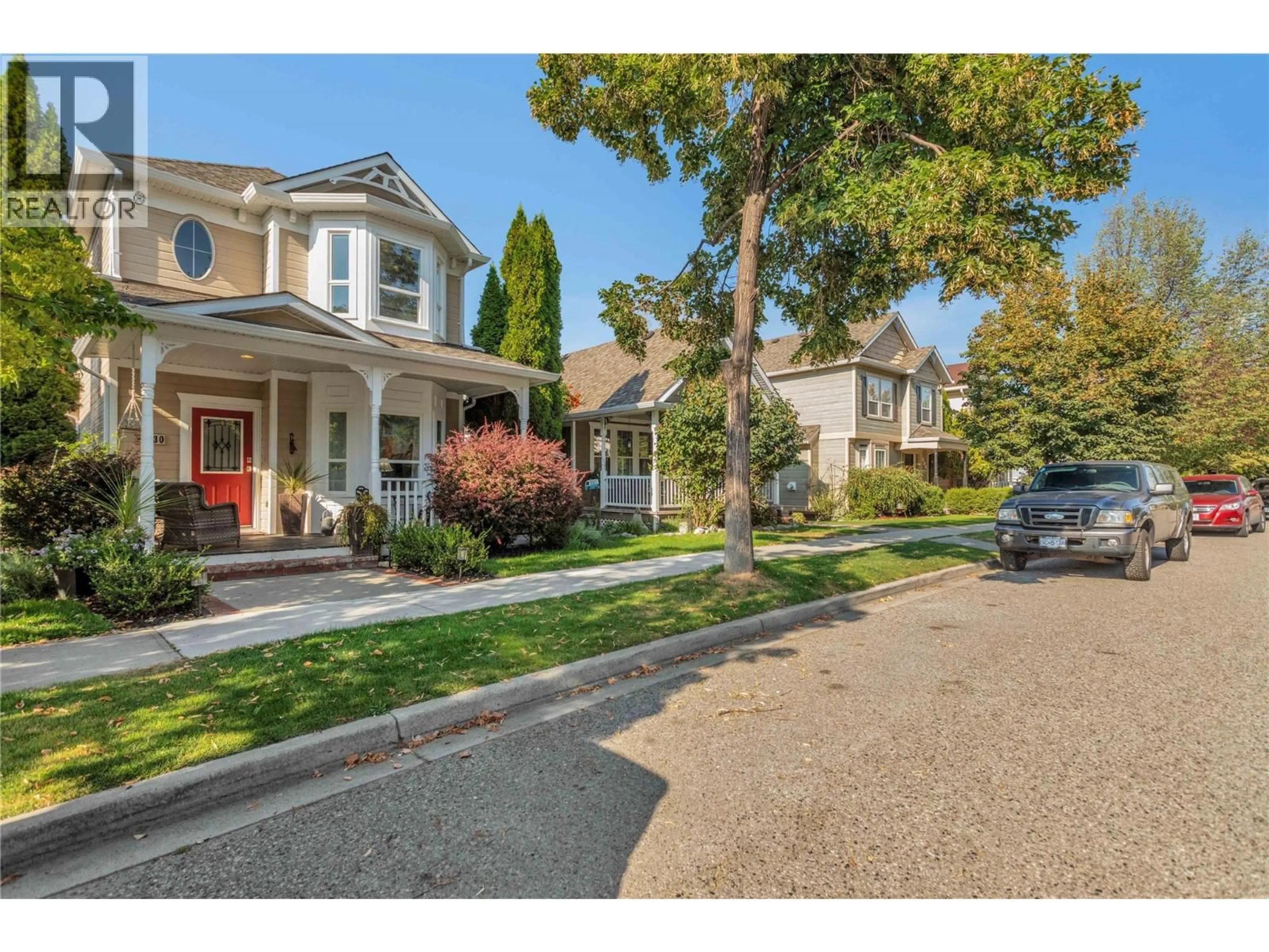 A pic from outside/outdoor area/front of a property/back of a property/a pic from drone, street for 430 MCCARREN AVENUE, Kelowna British Columbia V1W4T8