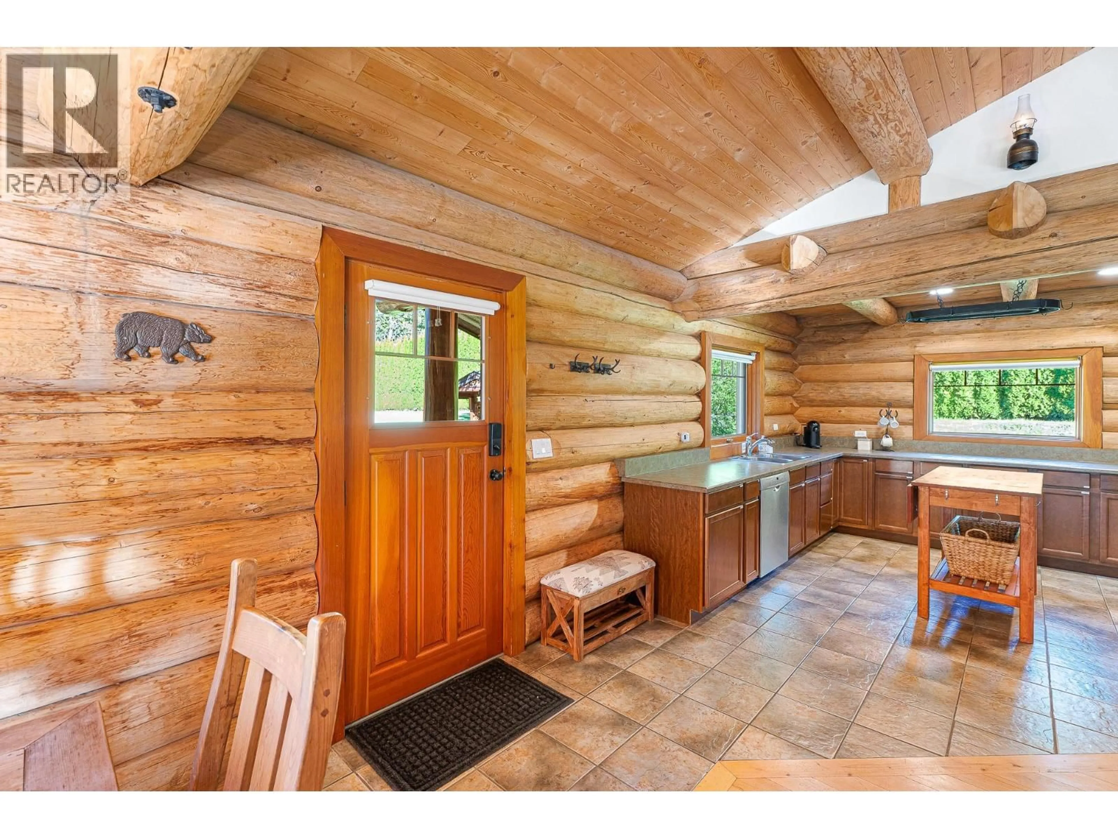 Rustic kitchen, wood/laminate floor for 1860 AGATE BAY ROAD, Barriere British Columbia V0E2E0
