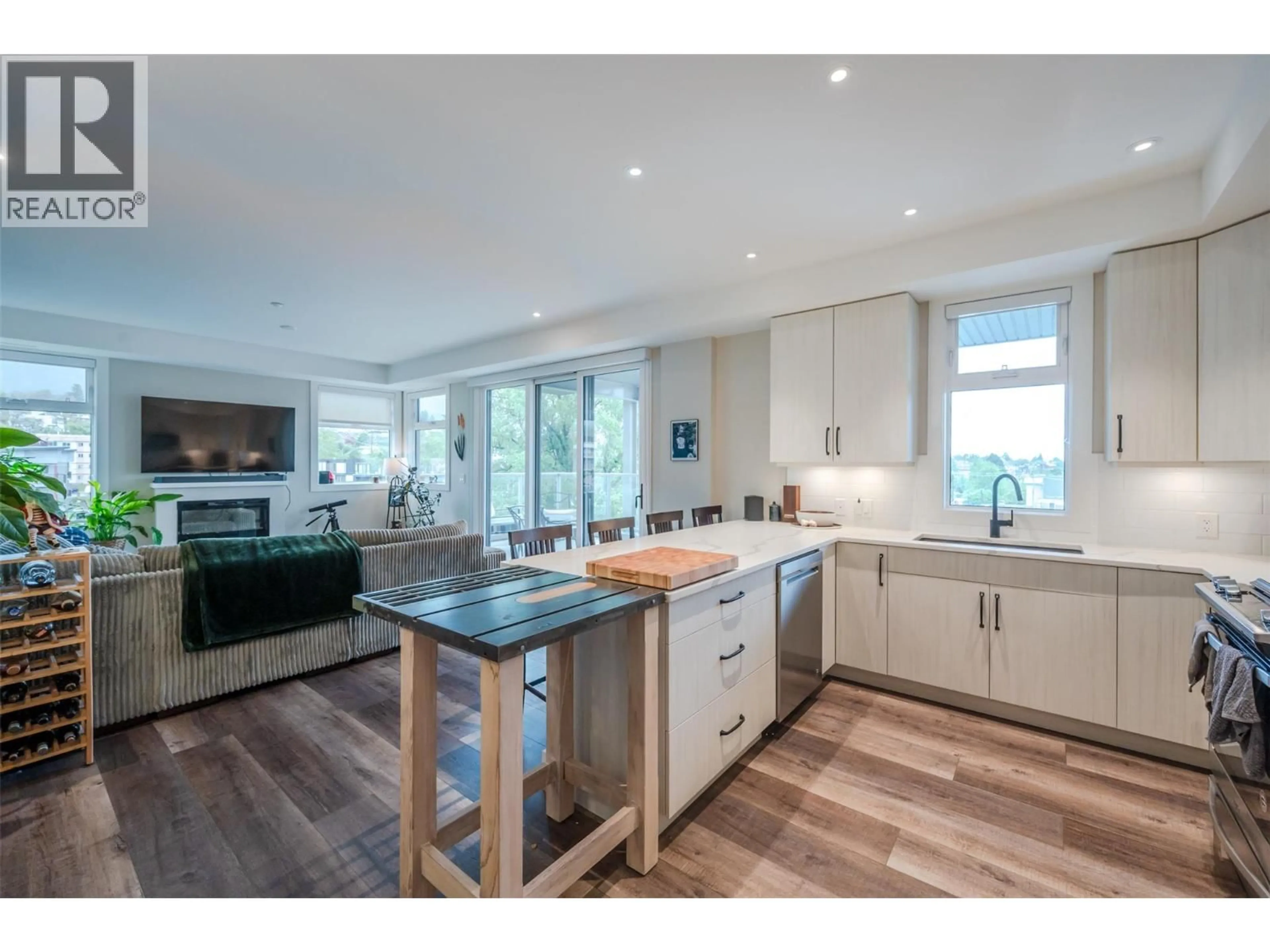Open concept kitchen, wood/laminate floor for 508 - 110 ELLIS STREET, Penticton British Columbia V2A4L5