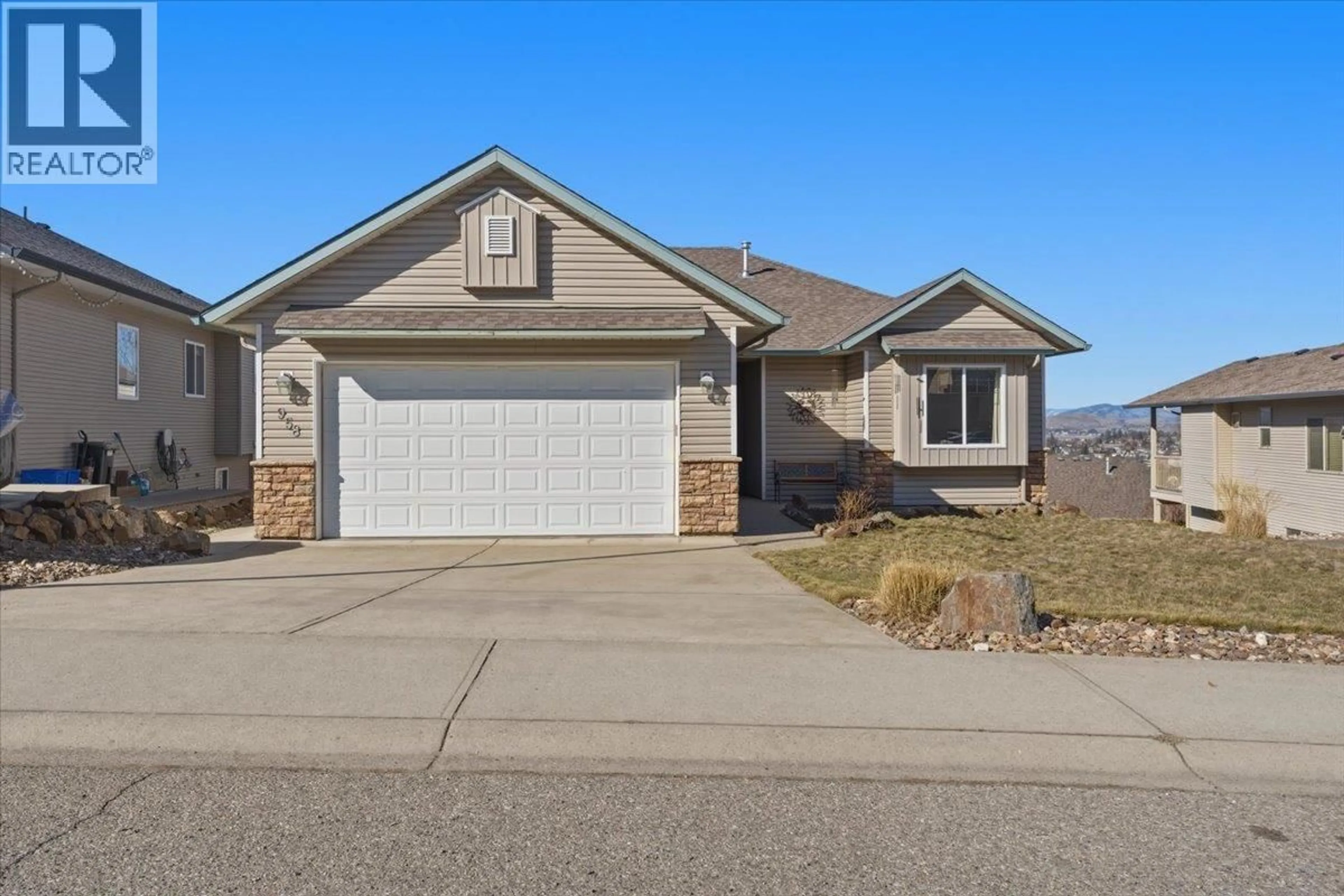 Home with vinyl exterior material, street for 958 MT BEGBIE DRIVE, Vernon British Columbia V1B2Z5