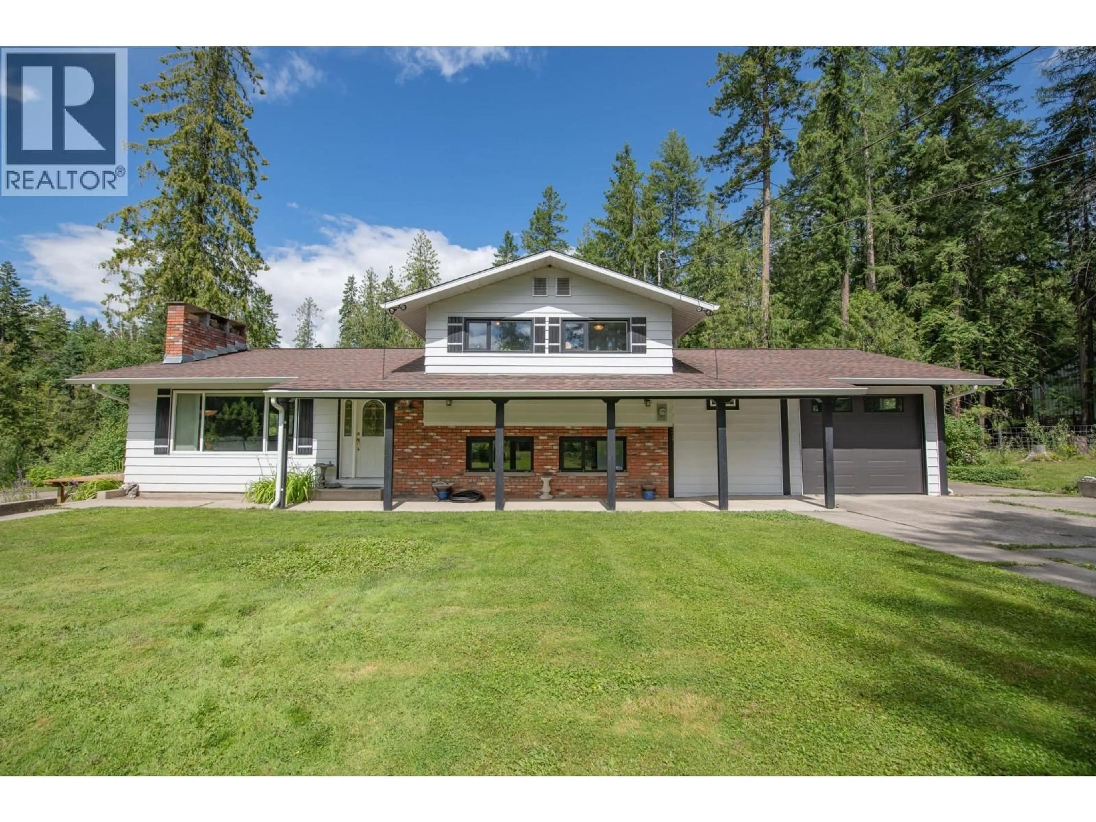 A pic from outside/outdoor area/front of a property/back of a property/a pic from drone, mountain view for 40 ROSOMAN ROAD, Enderby British Columbia V4Y4K4