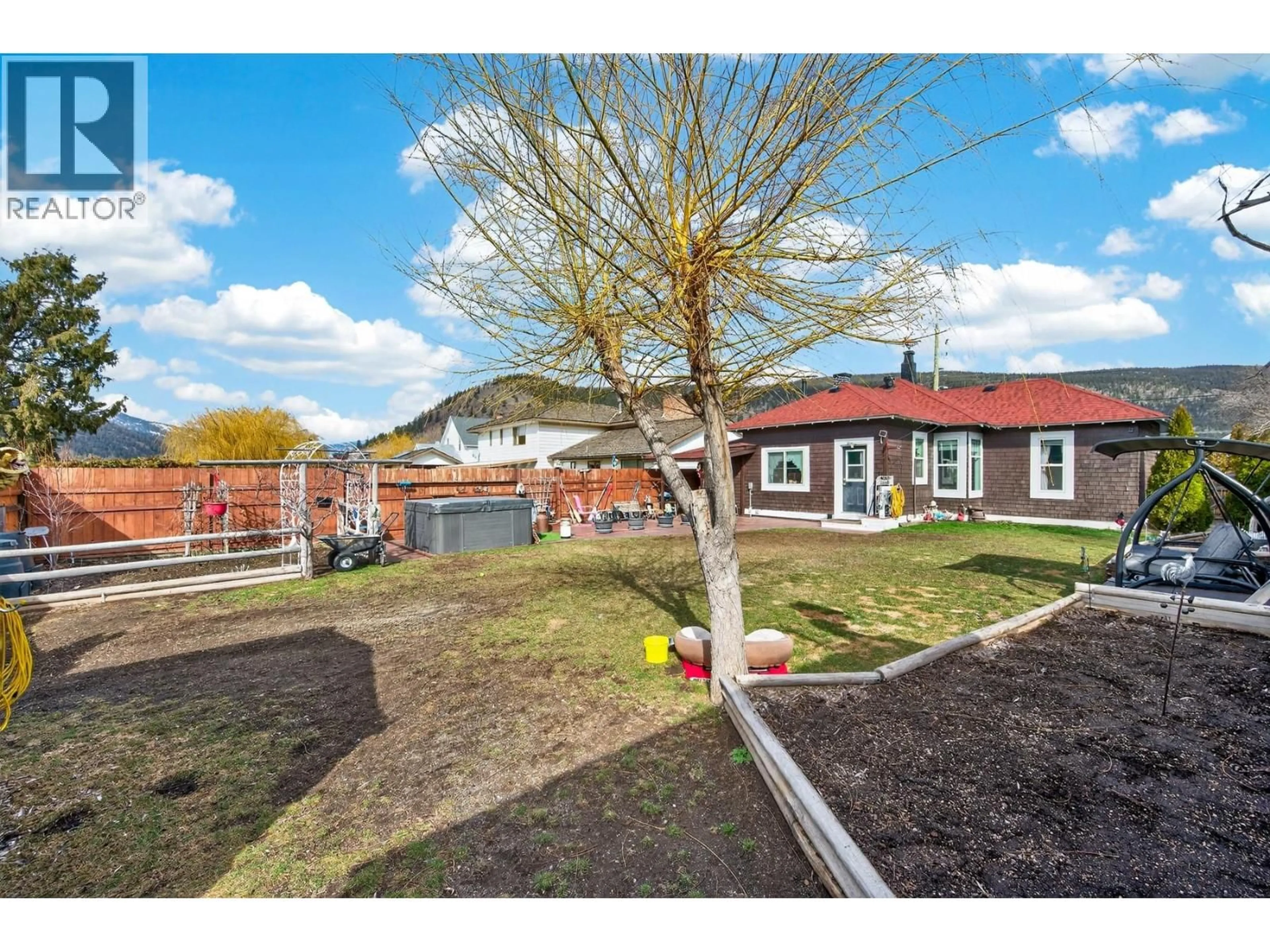 A pic from outside/outdoor area/front of a property/back of a property/a pic from drone, street for 1768 GRANITE AVENUE, Merritt British Columbia V1K1B8