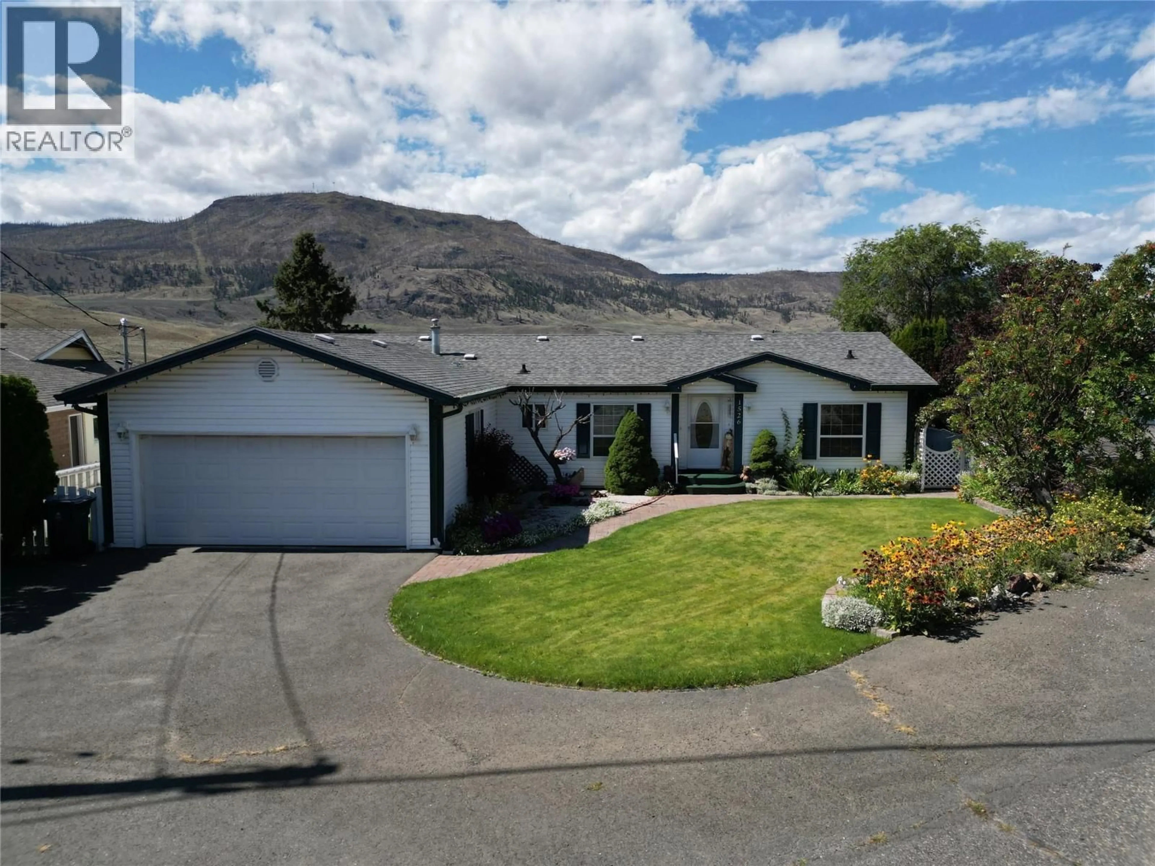 A pic from outside/outdoor area/front of a property/back of a property/a pic from drone, mountain view for 1526 CUMMING BOULEVARD, Cache Creek British Columbia V0K1H0