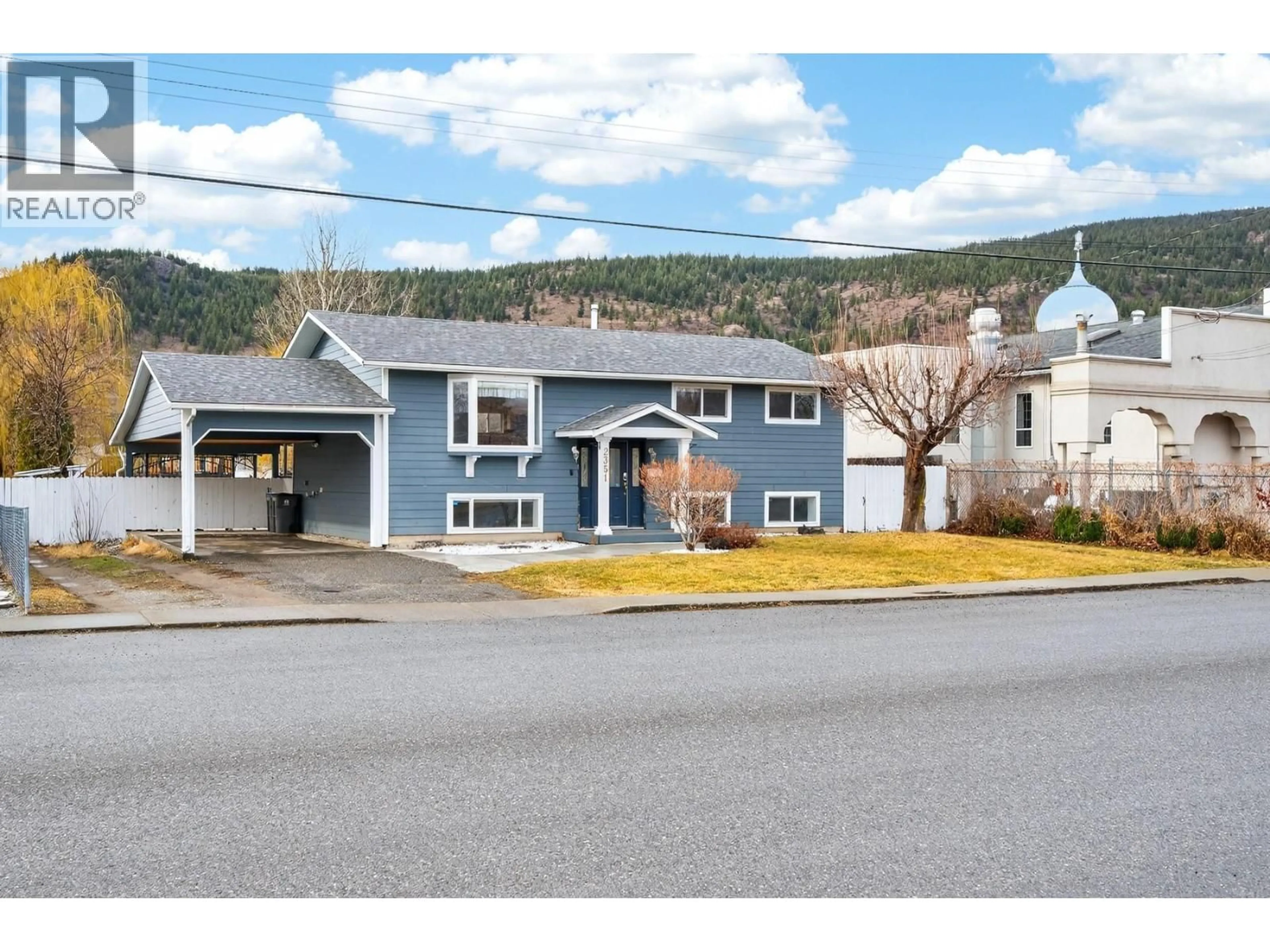 Home with vinyl exterior material, street for 2351 CHAPMAN STREET, Merritt British Columbia V1K1B8