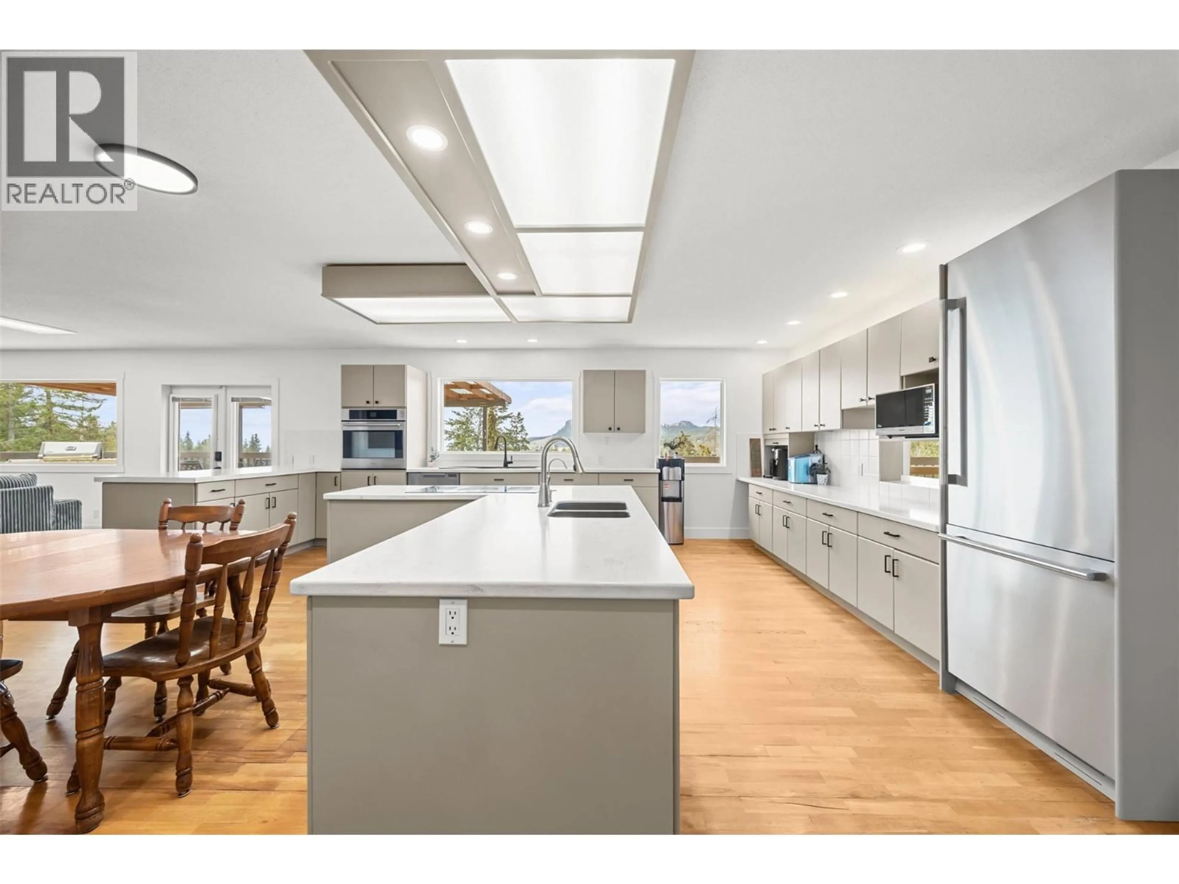 Open concept kitchen, unknown for 1618 HUCKLEBERRY ROAD, Kelowna British Columbia V1P1M5