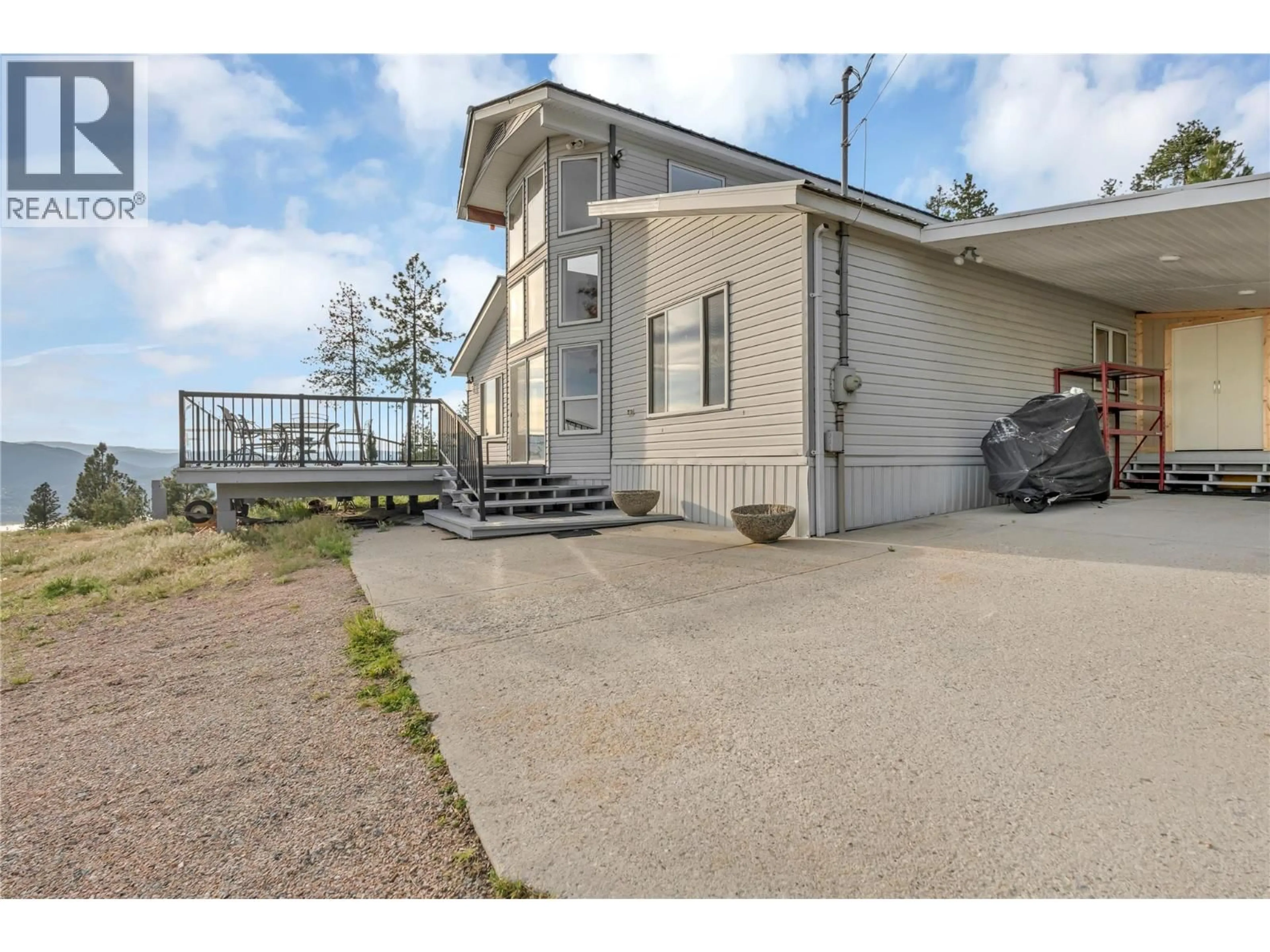 A pic from outside/outdoor area/front of a property/back of a property/a pic from drone, unknown for 2081 CARMI ROAD, Penticton British Columbia V2A8C5