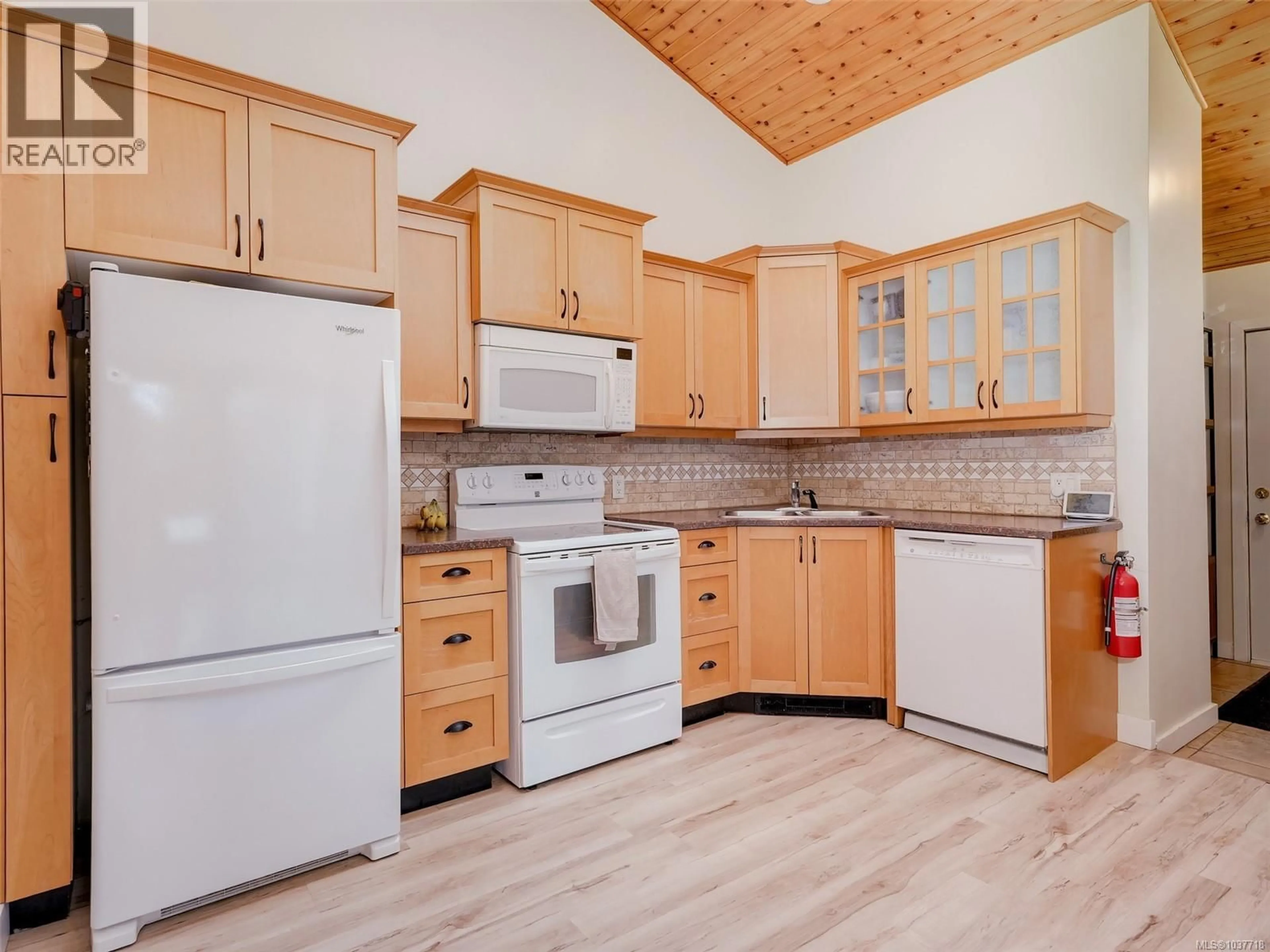 Standard kitchen, wood/laminate floor for 2723 GIBSON PLACE, Shawnigan Lake British Columbia V0R2W0