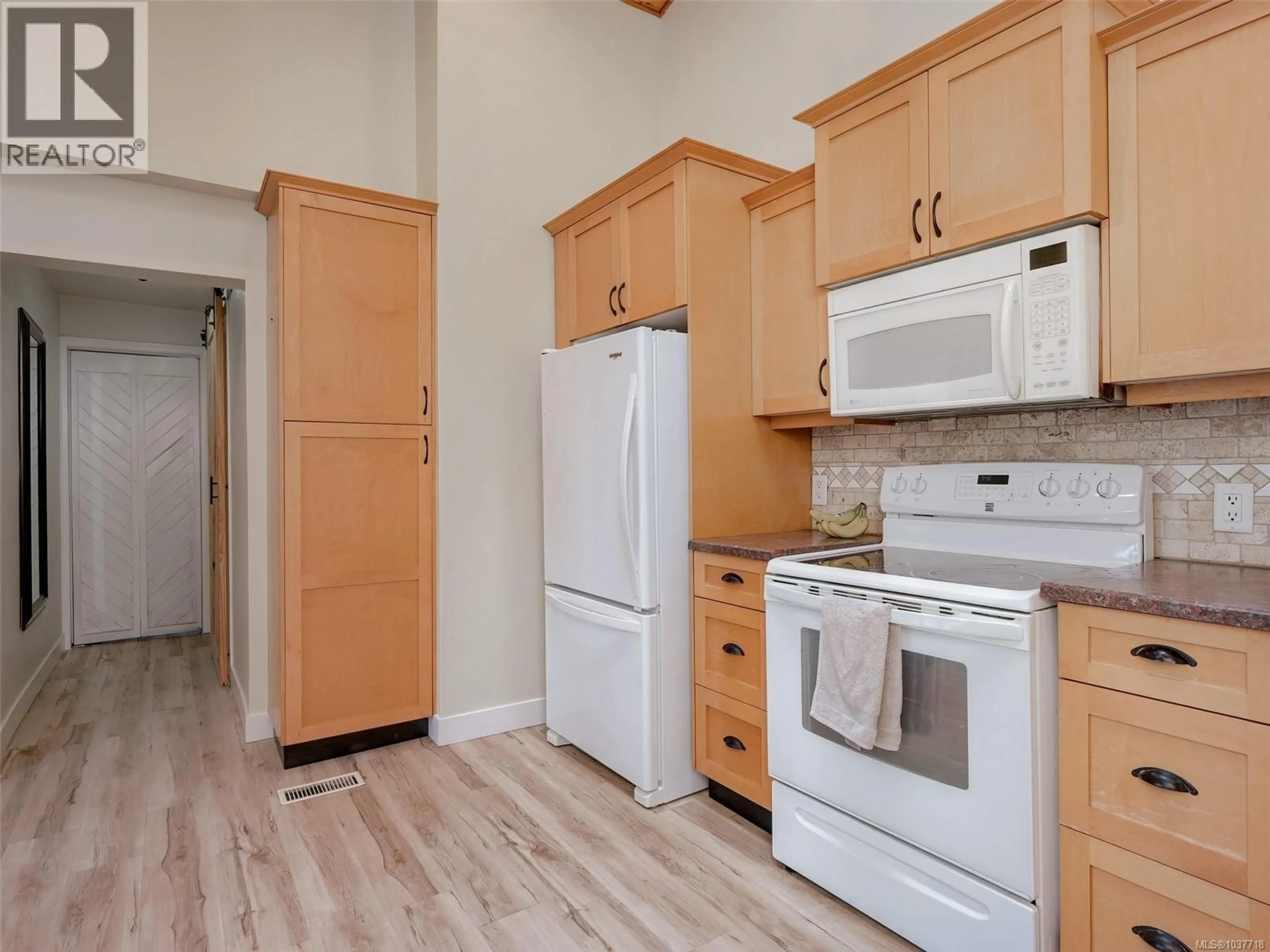 Standard kitchen, wood/laminate floor for 2723 GIBSON PLACE, Shawnigan Lake British Columbia V0R2W0