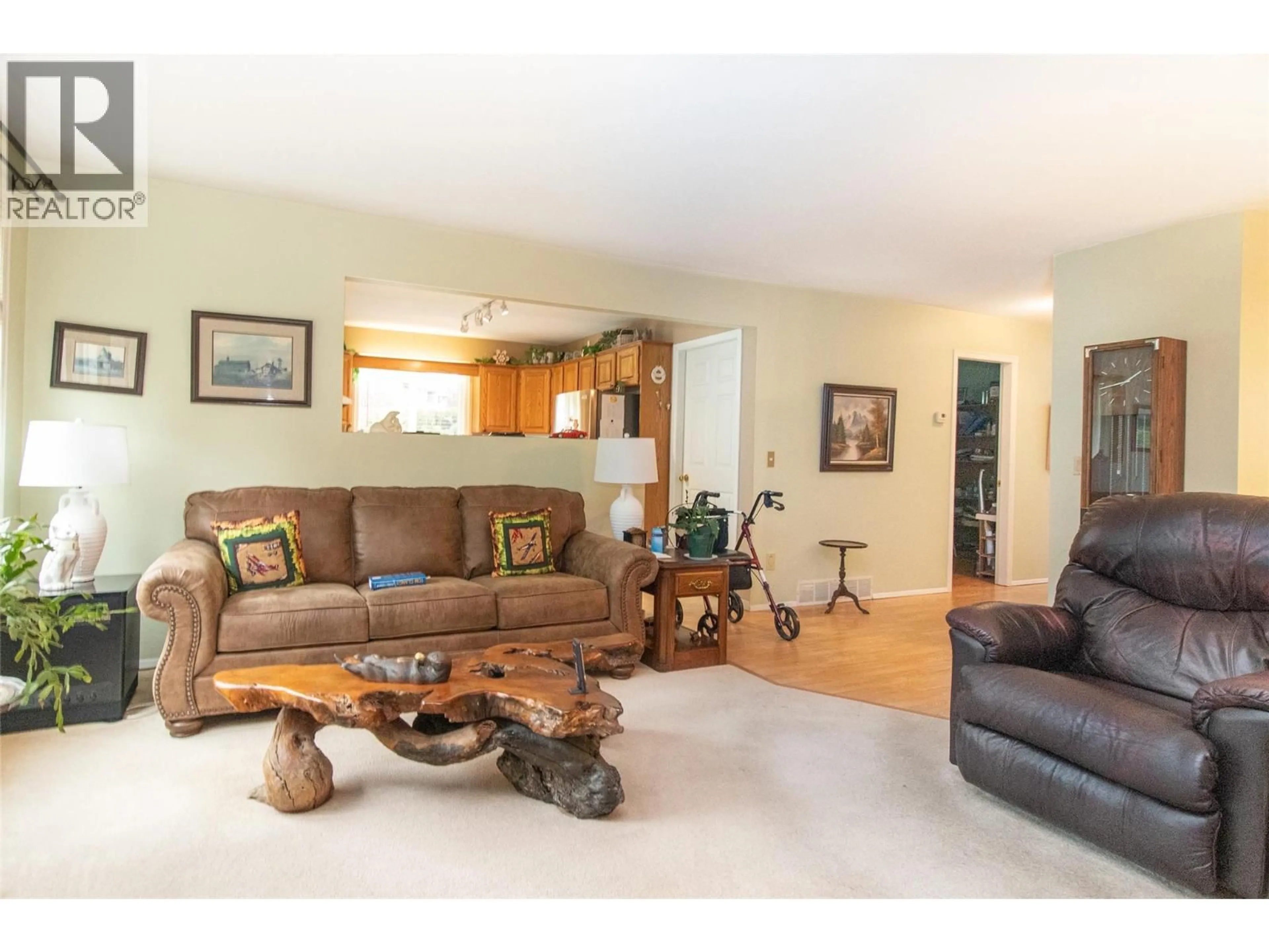 Living room with furniture, wood/laminate floor for 2 - 1209 BROOKSIDE AVENUE, Kelowna British Columbia V1Y5T5