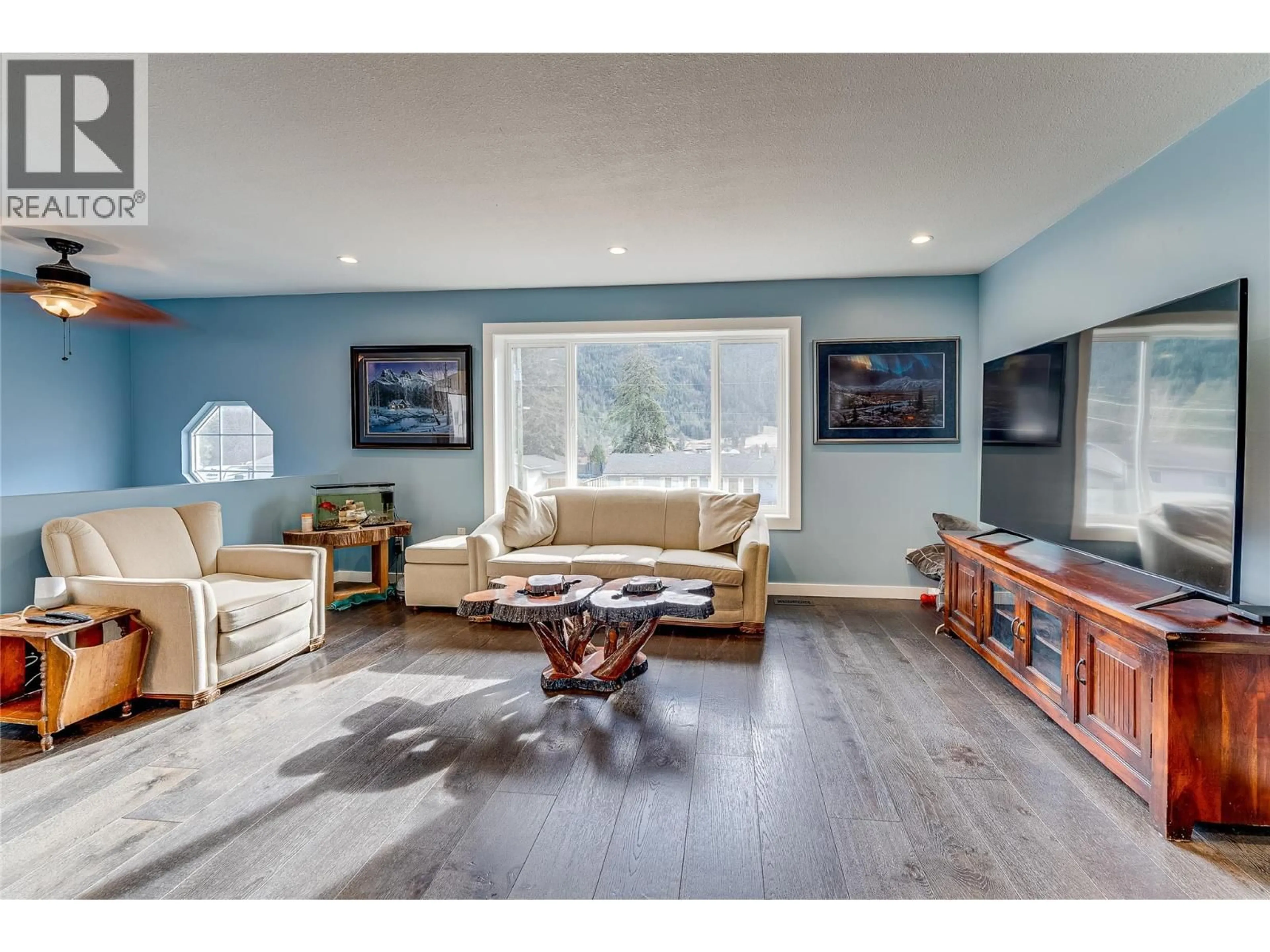 Living room with furniture, unknown for 5876 WESTWYND DRIVE, Falkland British Columbia V0E1W0