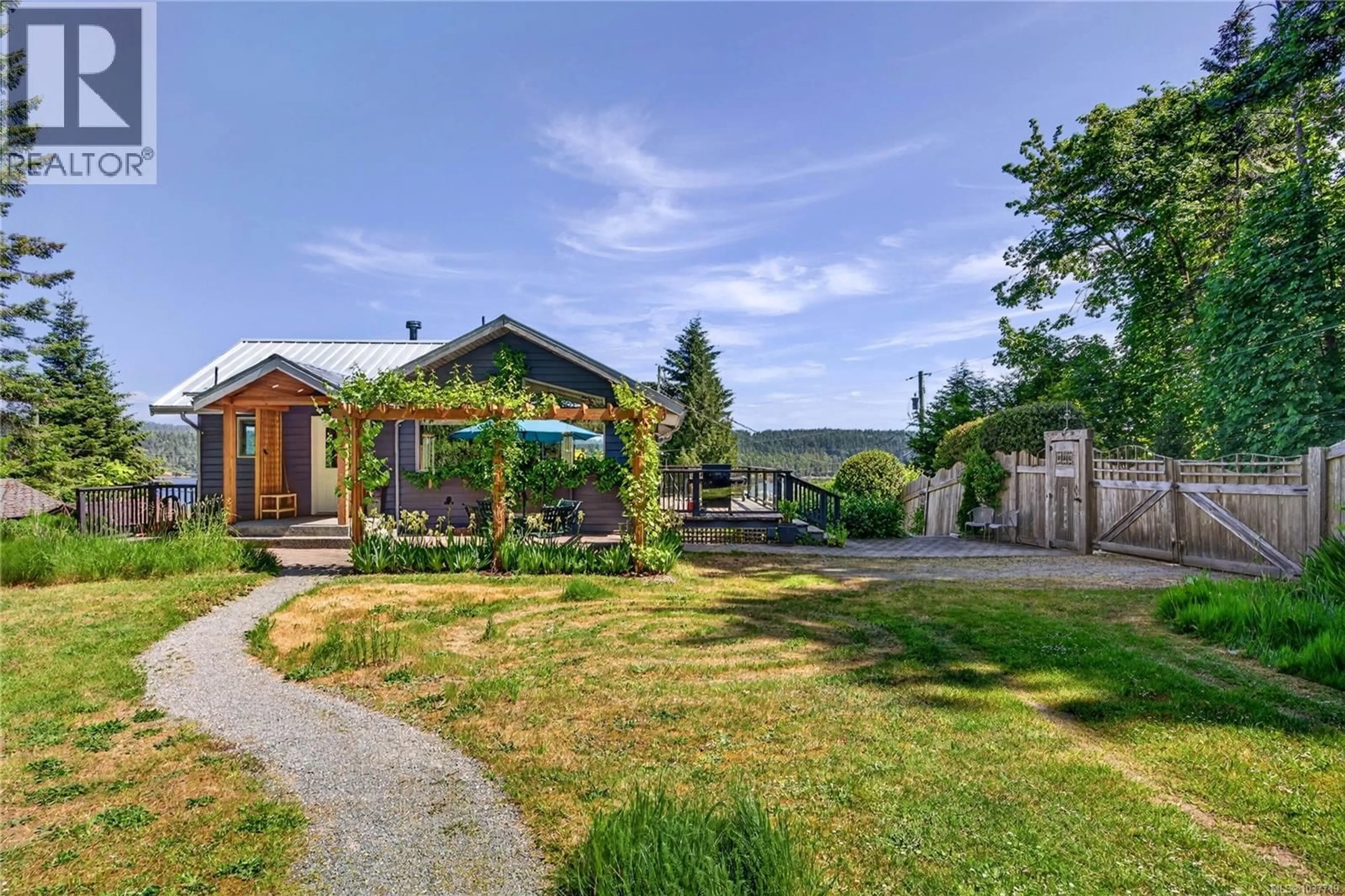 A pic from outside/outdoor area/front of a property/back of a property/a pic from drone, street for 144 DOUGLAS ROAD, Salt Spring British Columbia V8K2J2