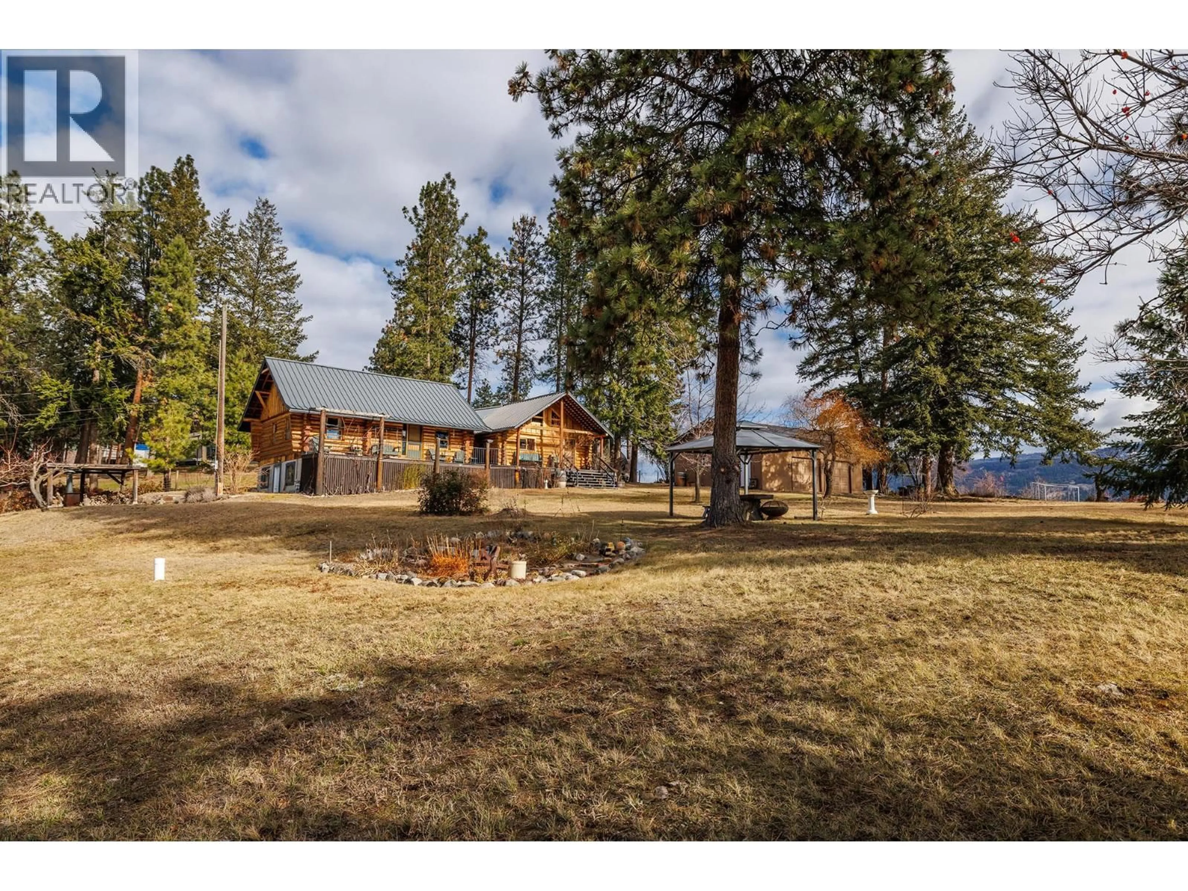 A pic from outside/outdoor area/front of a property/back of a property/a pic from drone, mountain view for 10775 HALLAM DRIVE, Lake Country British Columbia V4V1P1