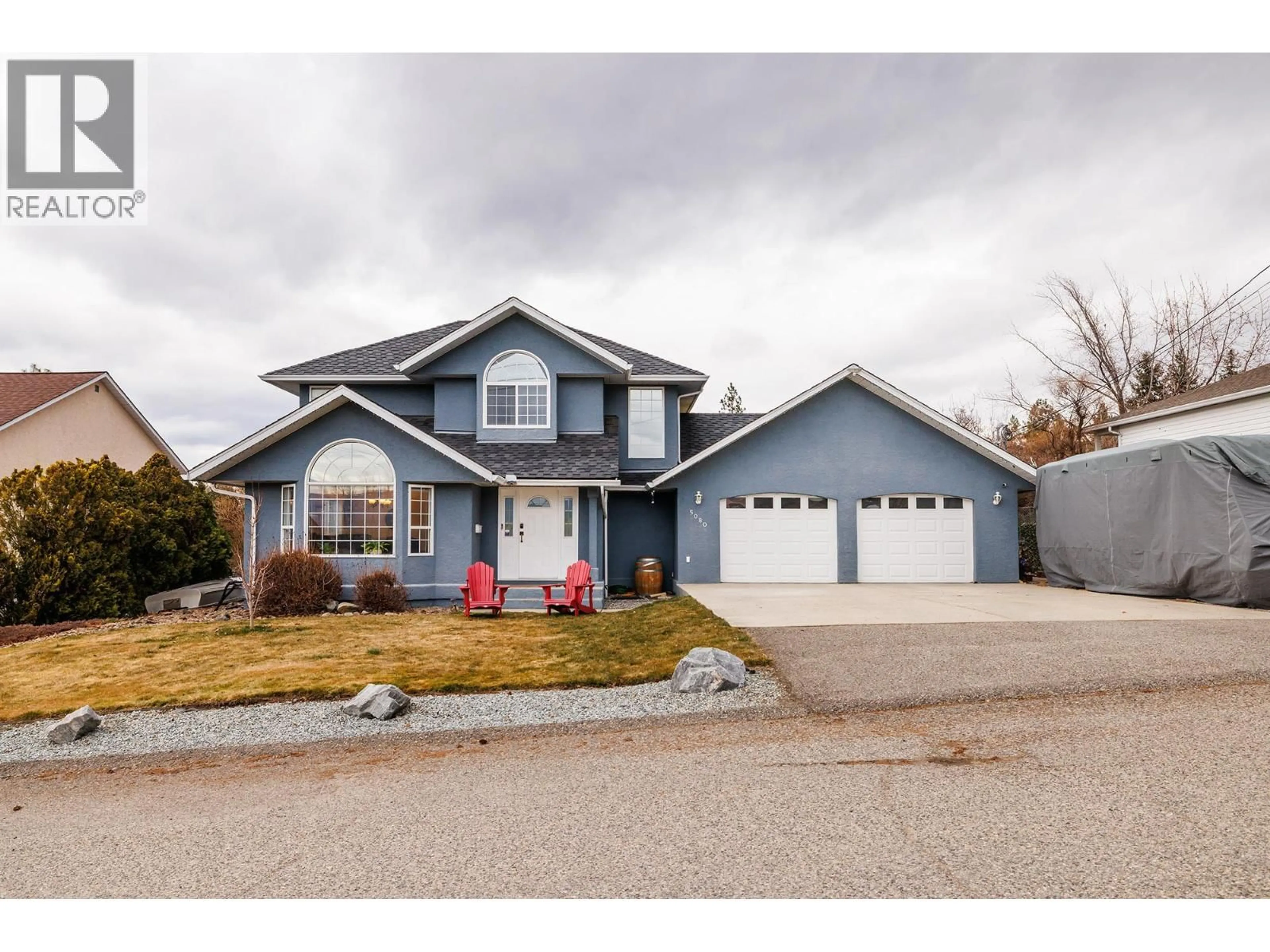 Home with vinyl exterior material, street for 5080 SCOTTY CREEK ROAD, Kelowna British Columbia V1X6T9