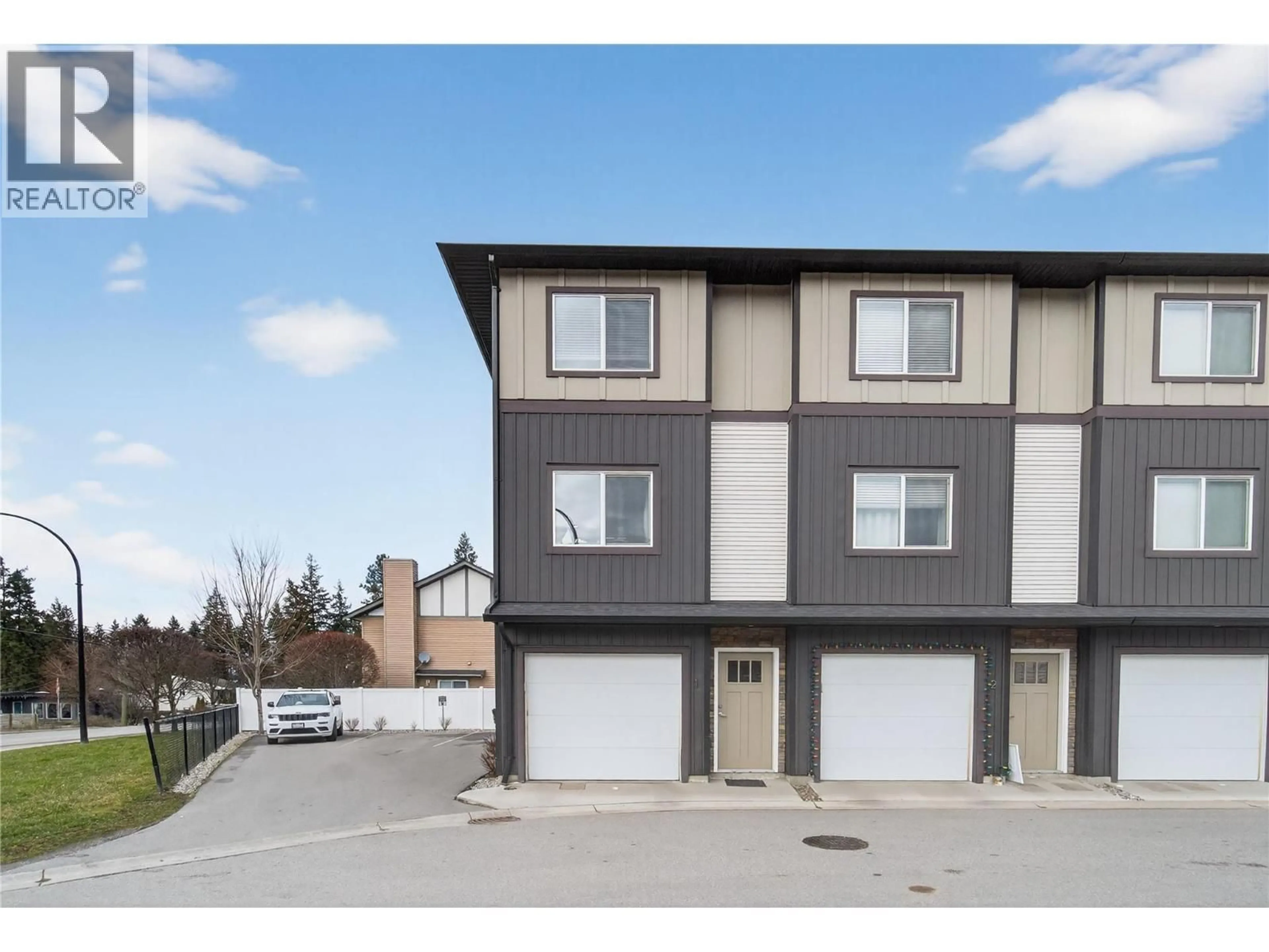 A pic from outside/outdoor area/front of a property/back of a property/a pic from drone, street for 1 - 2081 11 AVENUE NORTHEAST, Salmon Arm British Columbia V1E0G1