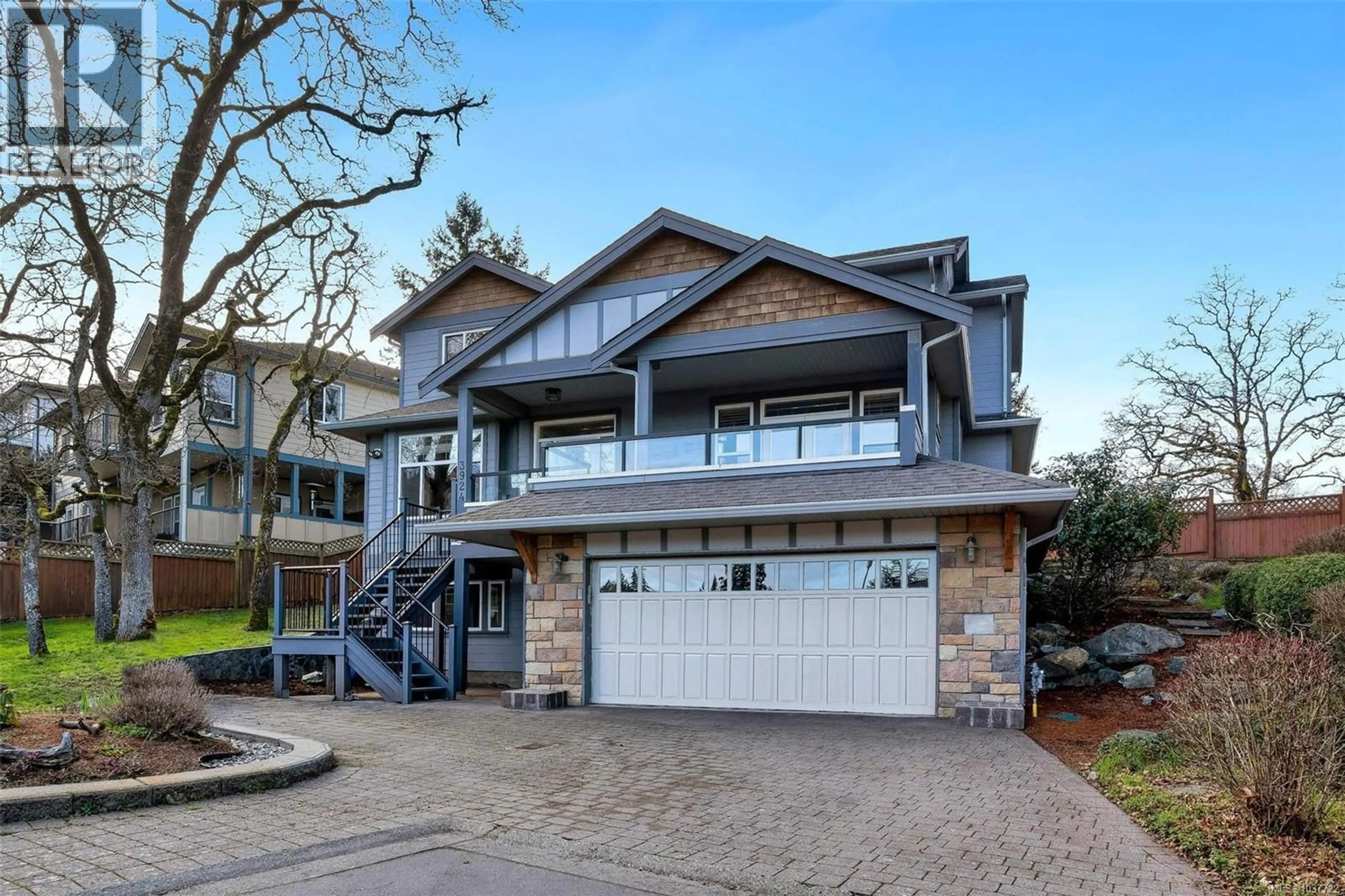 Home with brick exterior material, street for 3924 DRUCE LANE, Saanich British Columbia V8P0A2