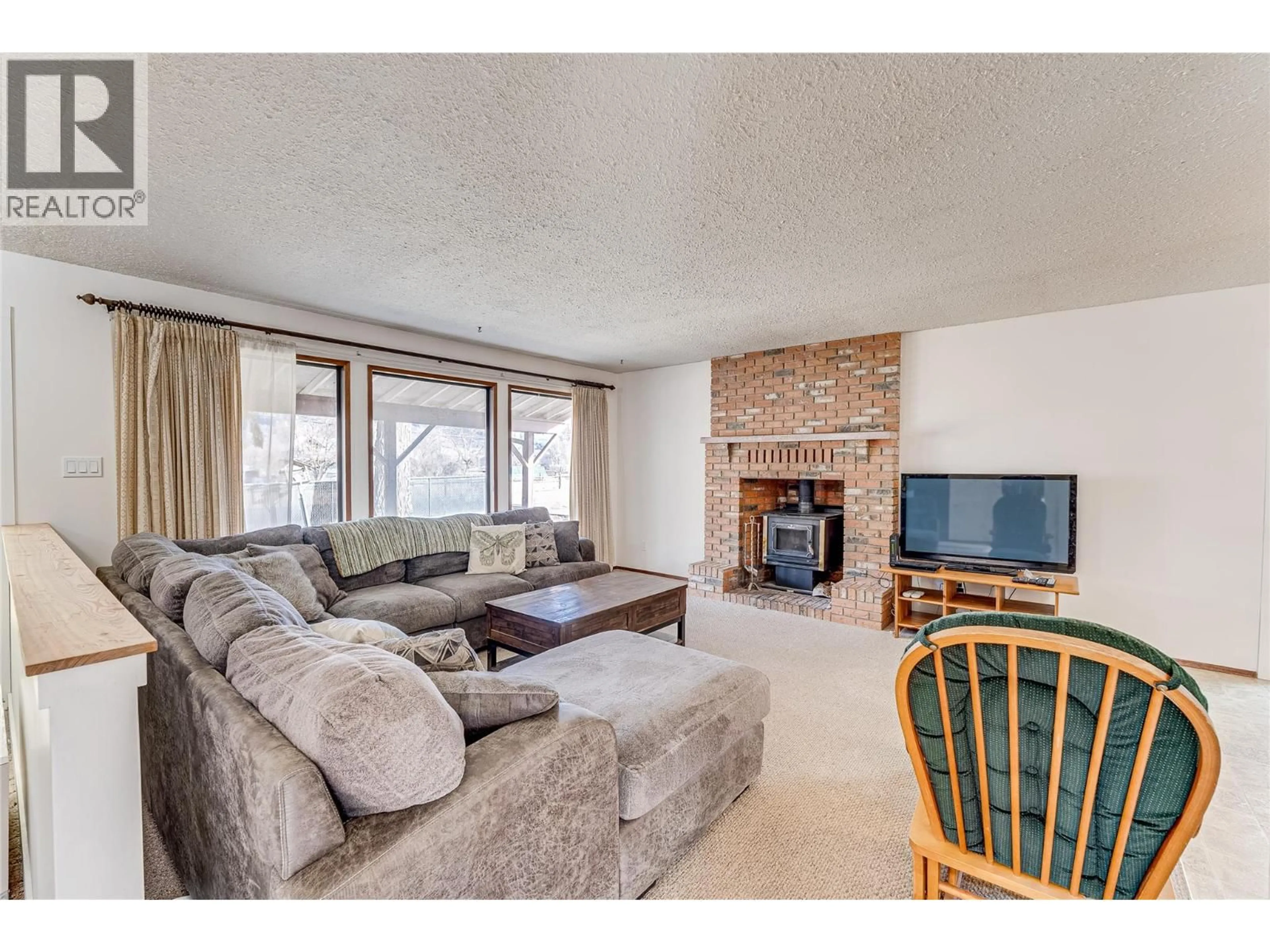 Living room with furniture, unknown for 6312 LEARMOUTH ROAD, Coldstream British Columbia V1B3G3