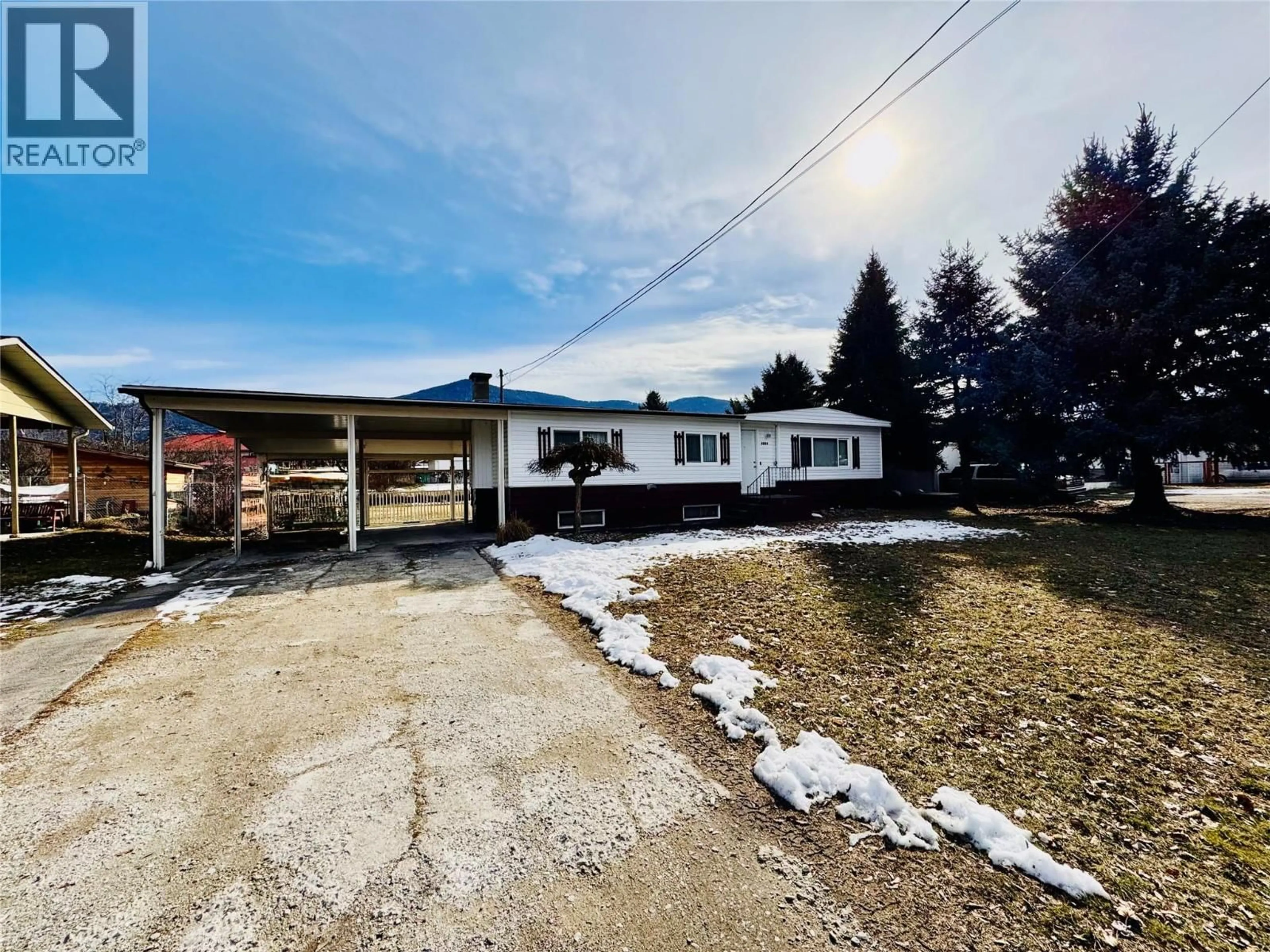 A pic from outside/outdoor area/front of a property/back of a property/a pic from drone, street for 1564 68TH AVENUE, Grand Forks British Columbia V0H1H0