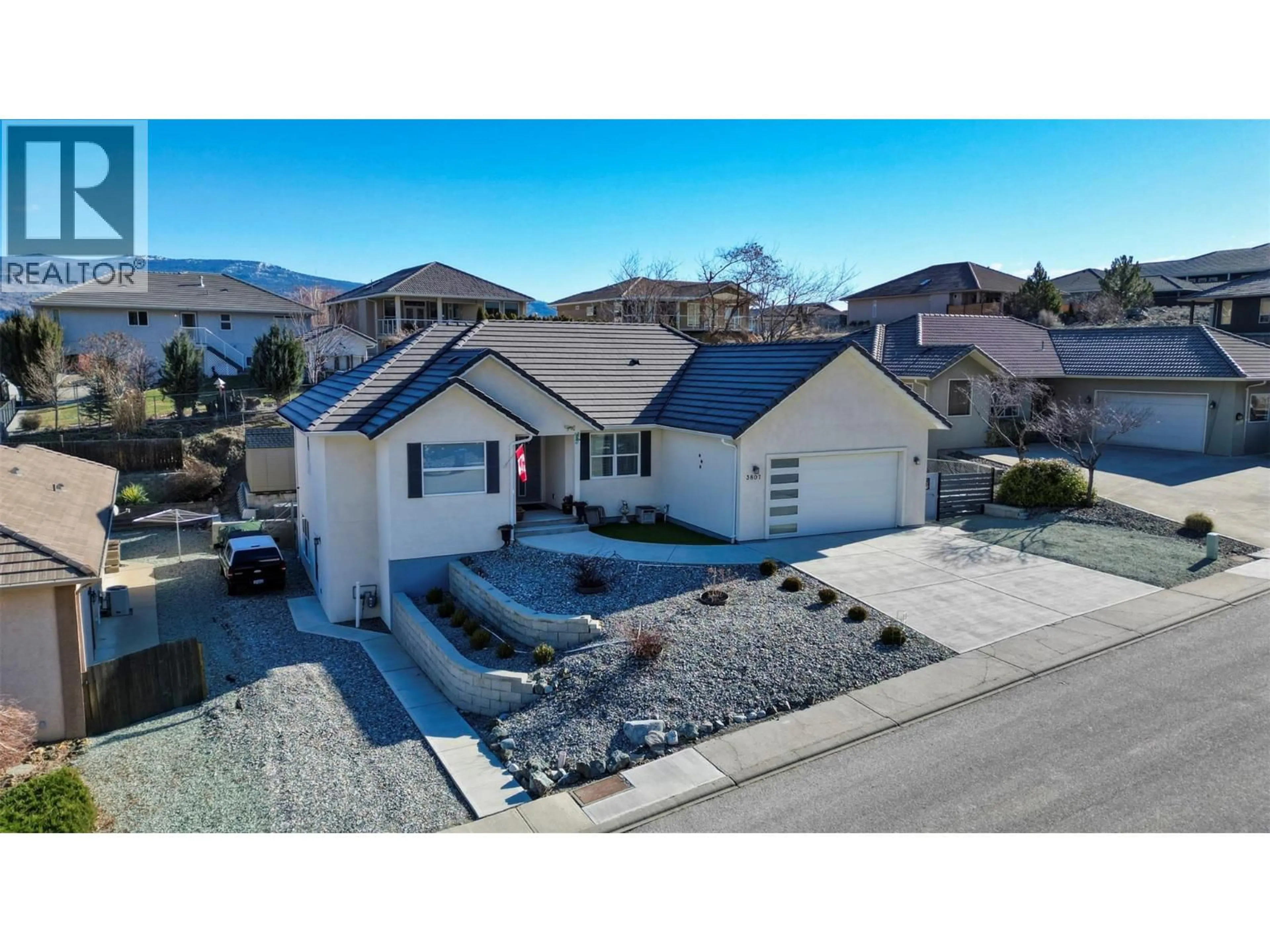 A pic from outside/outdoor area/front of a property/back of a property/a pic from drone, mountain view for 3807 FAIRWINDS DRIVE, Osoyoos British Columbia V0H1V4