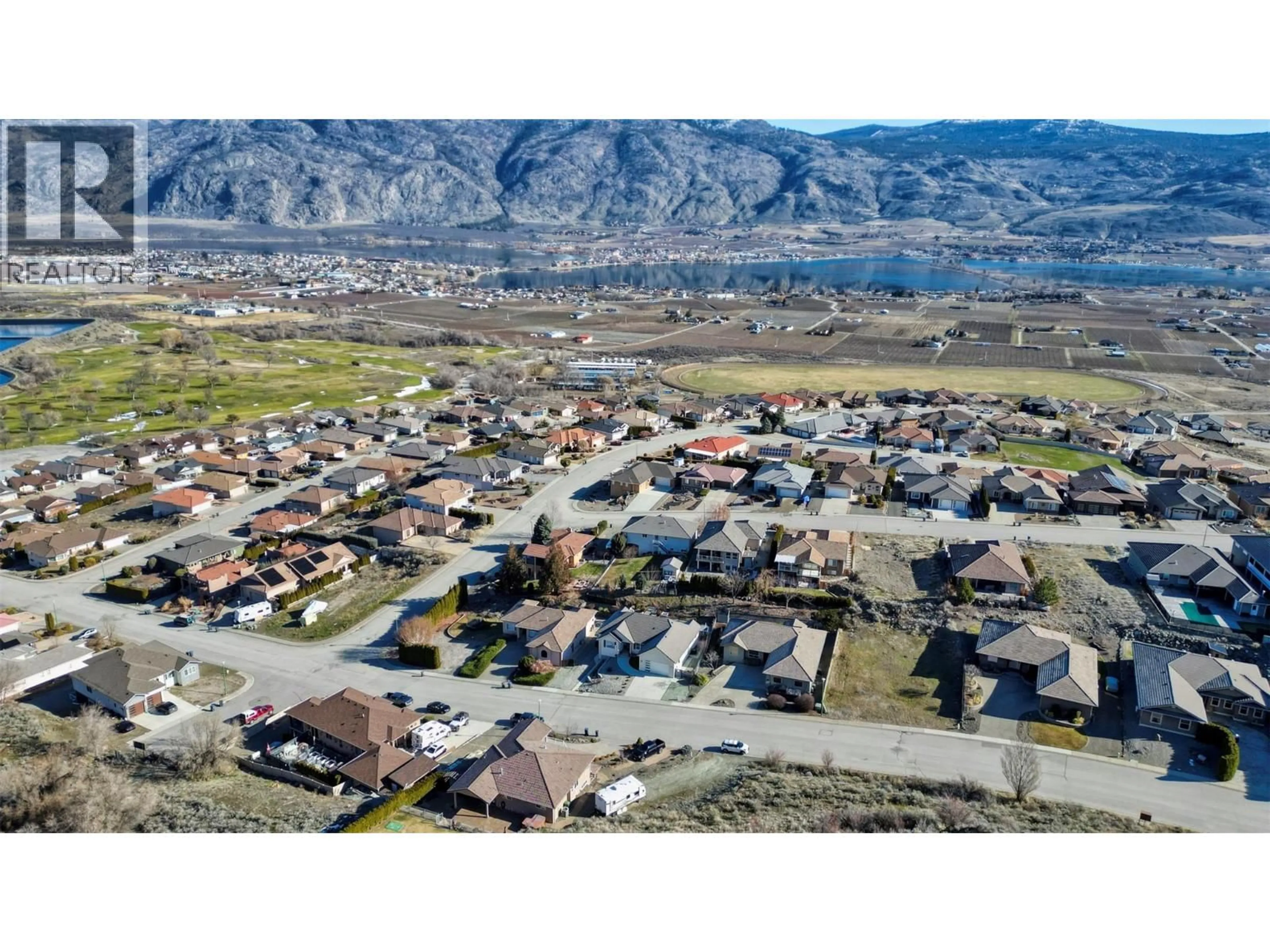 A pic from outside/outdoor area/front of a property/back of a property/a pic from drone, mountain view for 3807 FAIRWINDS DRIVE, Osoyoos British Columbia V0H1V4
