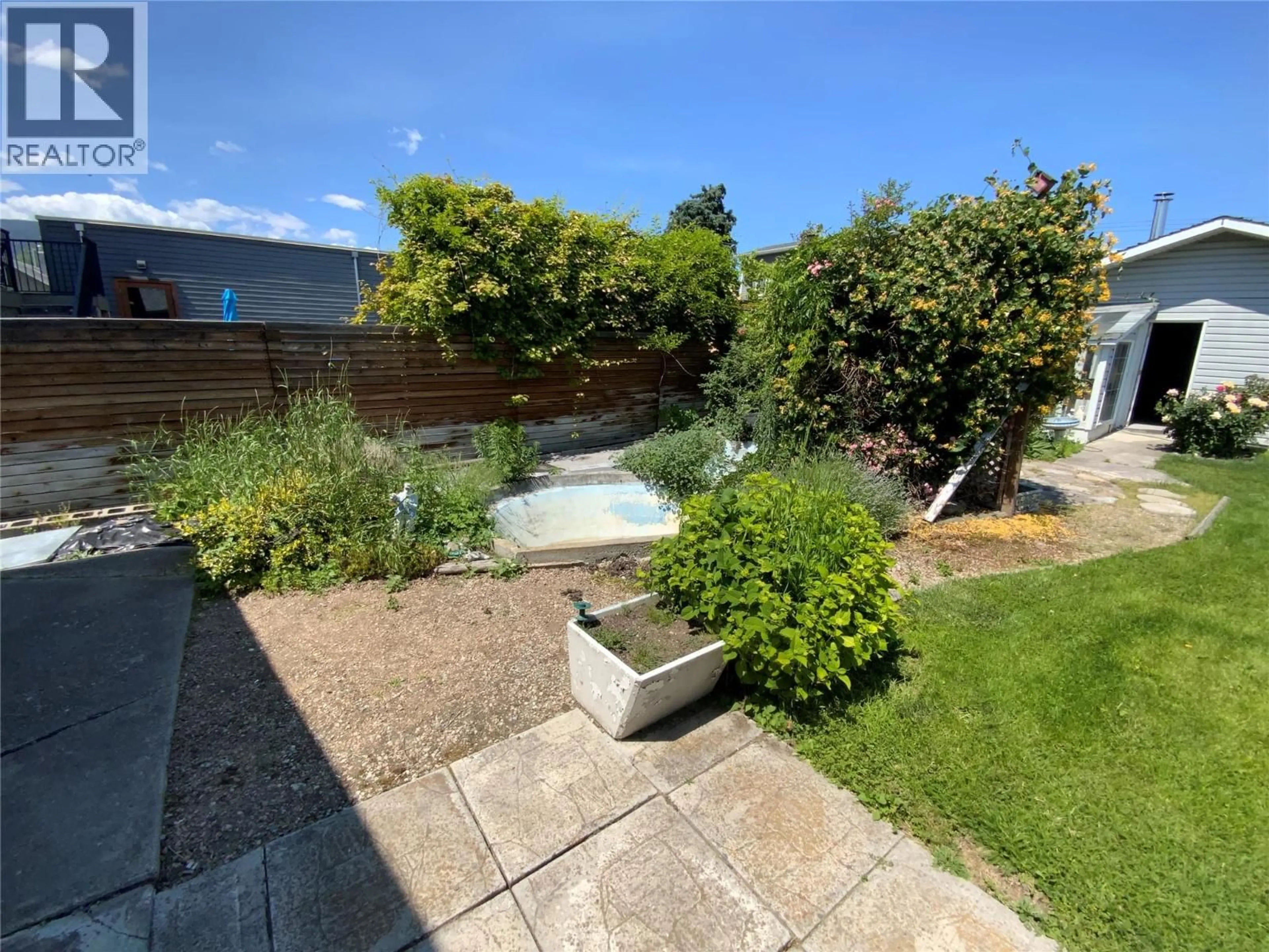 A pic from outside/outdoor area/front of a property/back of a property/a pic from drone, street for 449 CONKLIN AVENUE, Penticton British Columbia V2A2T3