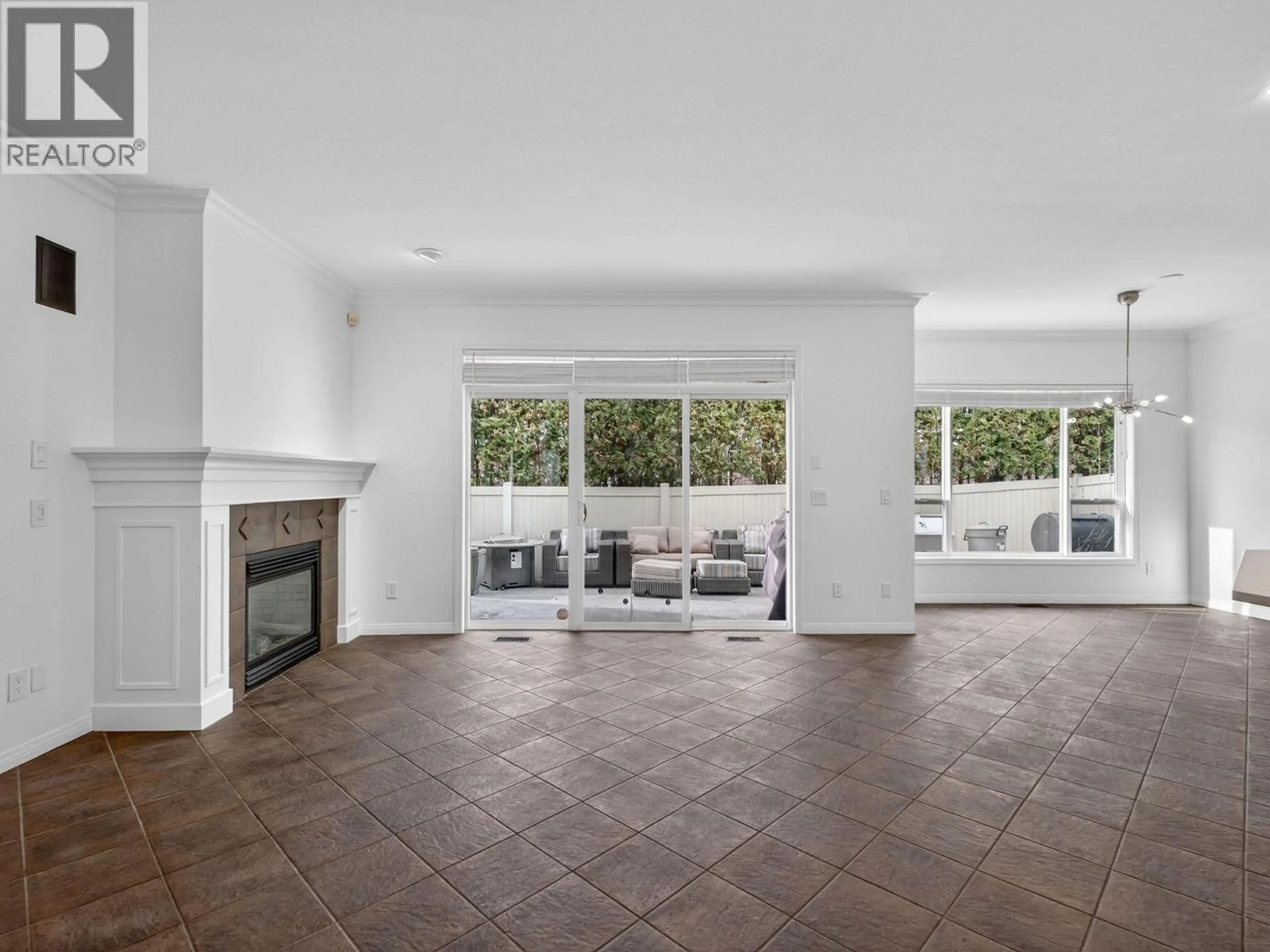 Living room with furniture, ceramic/tile floor for 208 - 665 COOK ROAD, Kelowna British Columbia V1W4T4