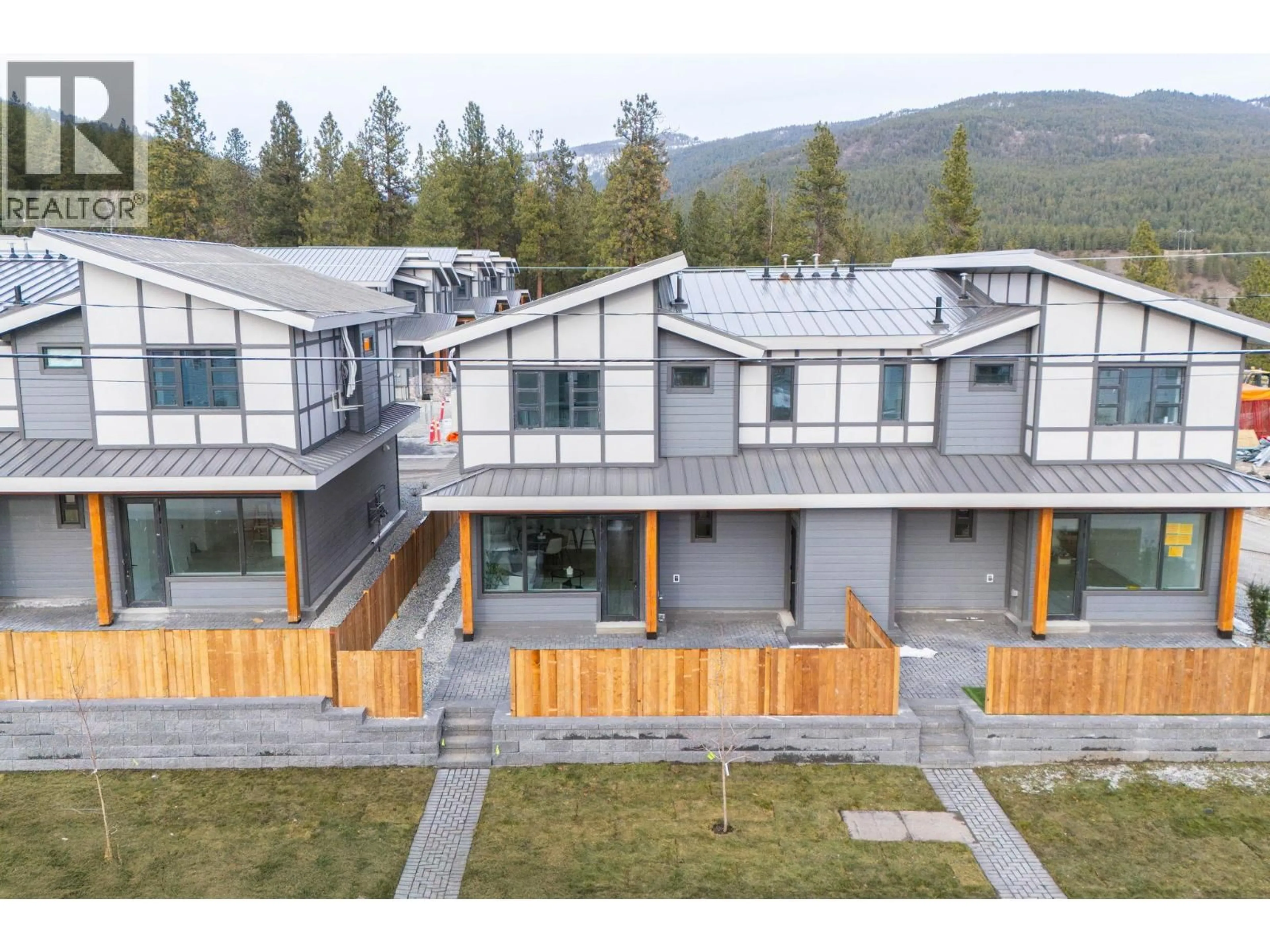 A pic from outside/outdoor area/front of a property/back of a property/a pic from drone, mountain view for 7 - 3210 SALMON ROAD, West Kelowna British Columbia V4T1A7