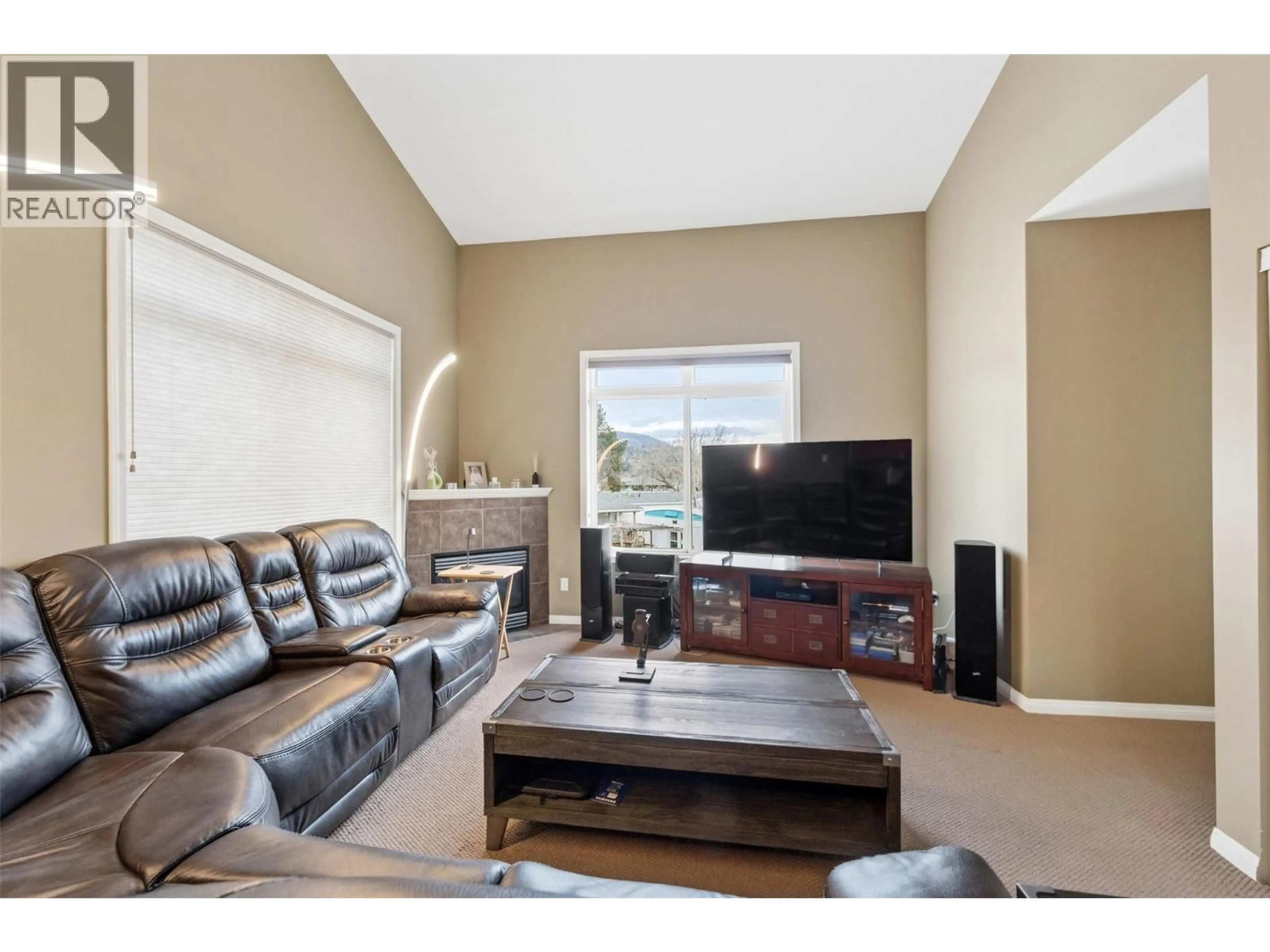 Living room with furniture, wood/laminate floor for 108 - 48 GALT AVENUE, Penticton British Columbia V2A9C3