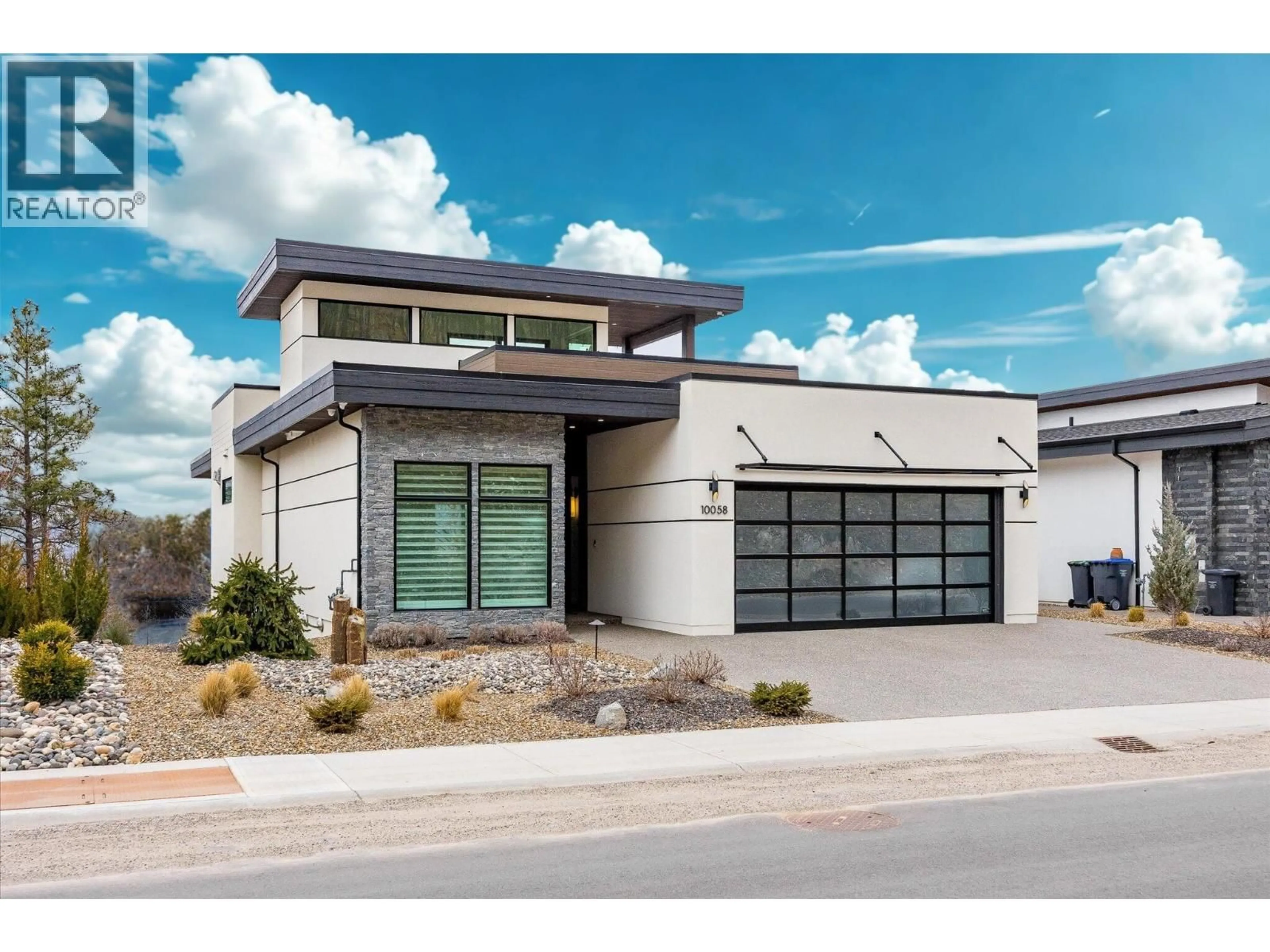 Home with vinyl exterior material, street for 10058 BEACON HILL DRIVE, Lake Country British Columbia V4V0A9